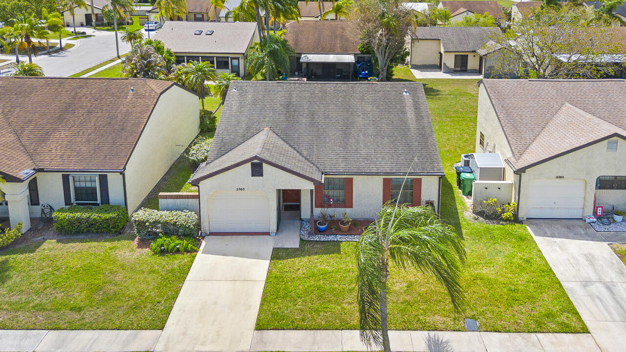Welcome Home!  Must see this beautiful 2 bedroom 2 bath home in Walton Court!  Low HOA of $200 covers lawn, cable, security and community pool!  This home has a New AC, Remodeled kitchen, tile throughout and a screened patio.  Located near a park with sports fields, next to the Savannas park and super close to the intercoastal!   Inquire today and make this affordable home yours!!!