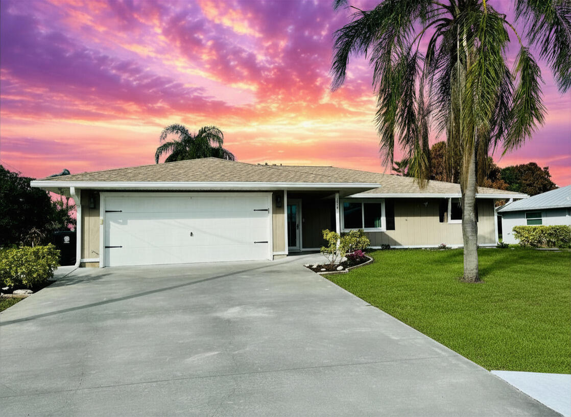 Welcome to this beautifully updated 3-bedroom, 2-bath home with a 2-car garage in the highly desirable Sandpiper Bay neighborhood of Port St. Lucie—one of the Treasure Coast's most sought-after communities with no HOA fees.. Designed for both comfort and style, this move-in-ready home features a spacious split-bedroom floor plan, vaulted ceilings, abundant natural light, and tasteful updates throughout. The remodeled kitchen is the heart of the home, with elegant black granite countertops, stainless steel appliances, soft-close cabinetry, and wood-plank porcelain tile flooring—perfect for everyday living and entertaining. The private primary suite offers a walk-in closet and a well-appointed en-suite Bath, while generously sized guest bedrooms provide comfort and Privacy for family,  visitors or a home office. Enjoy Florida living year-round from the large screened patio overlooking the backyard, creating the ideal space for relaxing or hosting friends and family. Hurricane impact windows provide added peace of mind, energy efficiency, and storm protection. Ideally located just minutes from beaches, boating, marinas, parks, the Saints Golf Course, the Port St. Lucie Botanical Gardens, the new Port District, shopping, dining, medical facilities, and major highways including US-1 and Florida's Turnpike, this exceptional home offers the perfect combination of location, convenience, and lifestyle. Don't miss this opportunity to own a beautifully updated home in one of Port St. Lucie's most established and desirable neighborhoods. Furniture is Negotiable.