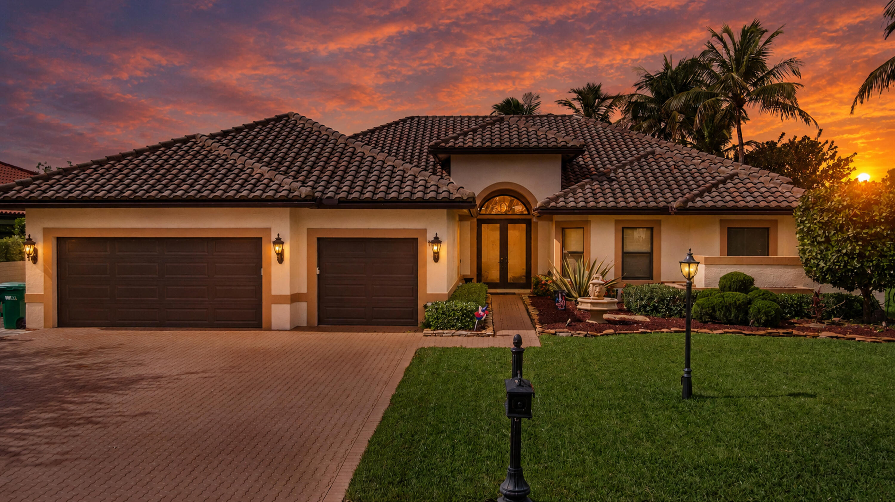 Welcome to this beautifully maintained **5-bedroom, 3.5-bath pool home in The Landings at Parkland**, one of Parkland's most sought-after guard-gated communities. Offering **3,245 square feet of living space**, soaring 12-foot ceilings, a bright open floor plan, and a spacious 3-car garage, this home is thoughtfully designed for comfortable everyday living and effortless entertaining.  The spacious interior features a wood-burning fireplace, newly painted walls, electric window shades, smart switches and dimmers throughout most of the home, and a flexible floor plan with a dedicated office featuring custom built-ins that easily serves as a fifth bedroom. The open kitchen flows seamlessly into the main living and family rooms, creating the perfect gathering space while large windows and sliding glass doors fill the home with natural light.  The expansive primary suite serves as a private retreat with direct access to the screened lanai, dual walk-in closets, and a spa-inspired ensuite featuring dual vanities, a soaking tub, separate shower, and a private water closet. The thoughtfully designed split floor plan offers privacy for family and guests, while two secondary bedrooms feature custom built-in bunk beds.  Recent improvements include a beautifully renovated guest bathroom, a newly redesigned laundry room with brand-new washer and dryer, utility sink, and custom cabinetry, PVC plumbing throughout, dual HVAC systems, a new pool pump, and an updated smart irrigation controller utilizing well water.  Outdoor living is equally impressive with a large screened lanai overlooking the heated pool and spa, a convenient cabana bath, newly landscaped side yard with upgraded paver patio, mature tropical landscaping, and generous yard space beyond the screened enclosure for additional outdoor enjoyment. Peaceful lake views provide a beautiful backdrop while maintaining privacy and a serene setting.  Located within **The Landings at Parkland**, an established guard-gated community known for its custom homes, generous homesites, mature landscaping, and timeless architecture, this exceptional residence is just minutes from Parkland's top-rated schools, parks, shopping, dining, and recreational amenities.