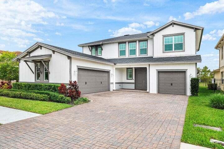 This spacious Lennar-built home is ideally situated on a quiet cul-de-sac and offers an open-concept layout with a highly desirable first-floor bedroom + full bath — perfect for guests, multi-generational living, or a home office setup. Features include impact windows, whole-home generator, motorized screened lanai, 3-car garage, abundant storage, and fully fenced backyard with privacy hedges and plenty of room for a custom pool. Thoughtfully designed for both everyday living and entertaining, all within one of Palm Beach County's most sought-after communities with resort-style amenities and top-rated schools.