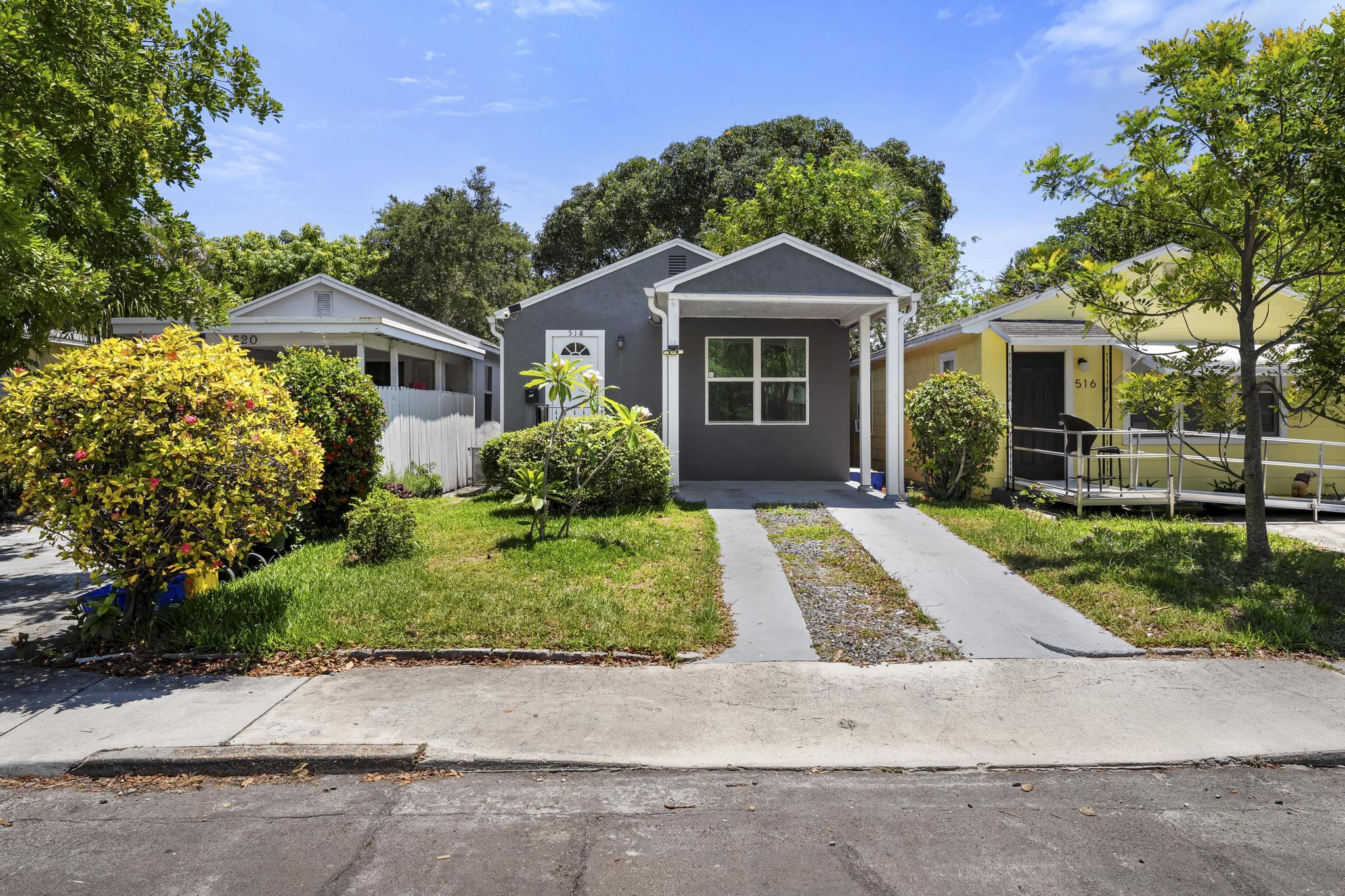 This charming 2-bedroom, 1-bathroom home is perfect for first-time homebuyers, seasonal residents, or investors looking for a strong rental opportunity. Situated in the heart of Lake Worth Beach, this cozy home offers newer impact windows, natural gas appliances, and LVP flooring throughout the main living areas. Enjoy the beautiful outdoor space featuring mature fruit trees and plenty of room for entertaining, gardening, or future expansion including room for a pool. No HOA means more freedom and fewer restrictions. Ideally located just minutes from downtown Lake Worth, the beach, shopping, dining, and the airport make this a rare opportunity to own an affordable home in Palm Beach County!