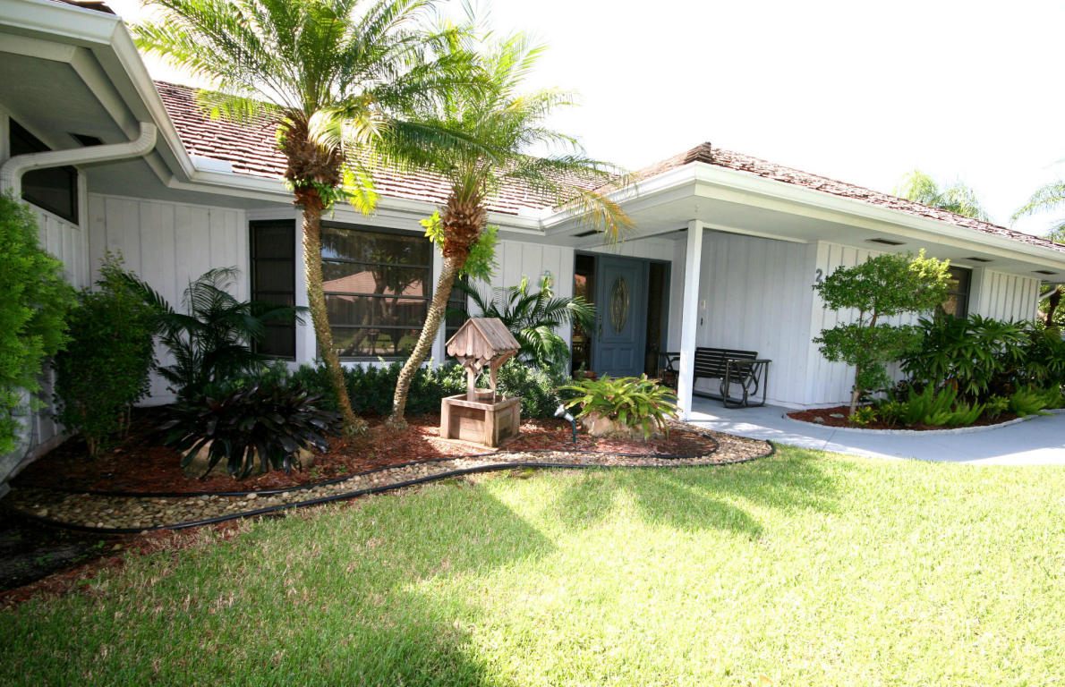 Lovely panoramic lakefront home situated in prime location of PGA National. This roomy, 4-bedroom, one- story home boasts expansive outdoor living space and large heated pool within a screened enclosure. The spacious living room with soaring vaulted ceilings and skylights provides plenty of space for entertaining. The open kitchen which boasts granite counter tops, wooden cabinets and stainless appliances is strategically located between the formal living room and family room with a cozy breakfast area overlooking the tranquil lake. Have peace of mind in knowing this home has been well maintained and comes with a comprehensive home warranty contract. Enjoy all the excitement of the annual Honda Classic plus all the activities offered by the PGA Resort just moments from your new home.