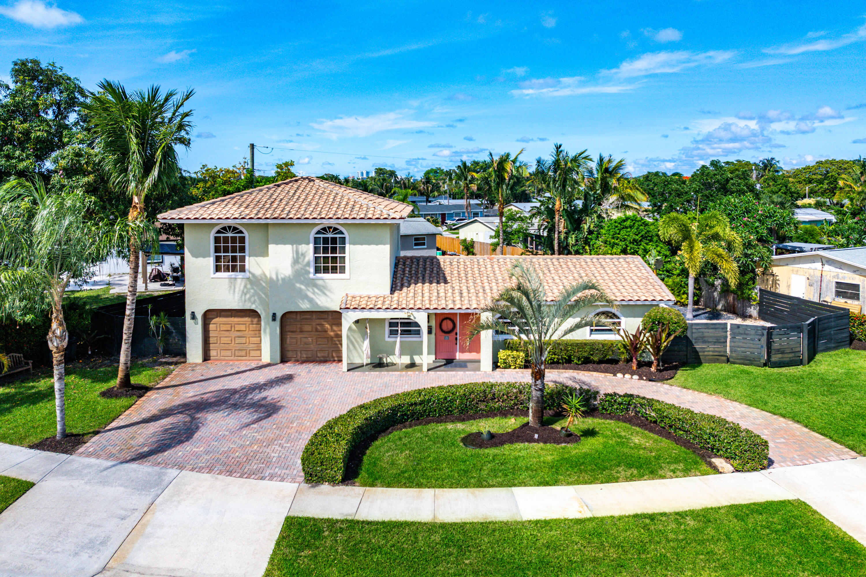 Experience the ultimate in Florida lifestyle in this beautifully updated 3-bedroom 2-bathroom home in desirable North Palm Beach. Featuring a newly refinished SALTWATER POOL w/ Commercial grade heater & chiller, expansive outdoor patio, and an attached two-car garage. This bright coastal retreat is just minutes from pristine beaches, top-tier dining and world-class golf.  2025 Remodel:New porcelain floors downstairs, kitchen backsplash, baseboards/ trim, doors.  All new paint throughout   Recent insurance 4 point inspection w zero items of concern.  Pool completely redone with new travertine deck & heater 2023   Master bath complete remodel 2022  Items to highlight: Large garage, circular drive (lots of parking)  Boat/ RV parking behind fence.  Master suite on second floor* Second floor master suite* Salt water pool, mature landscaping, NO HOA, Hurricane windows, Open Kitchen, Great neighborhood & neighbors, RainBird Automated Irrigation system throughout.