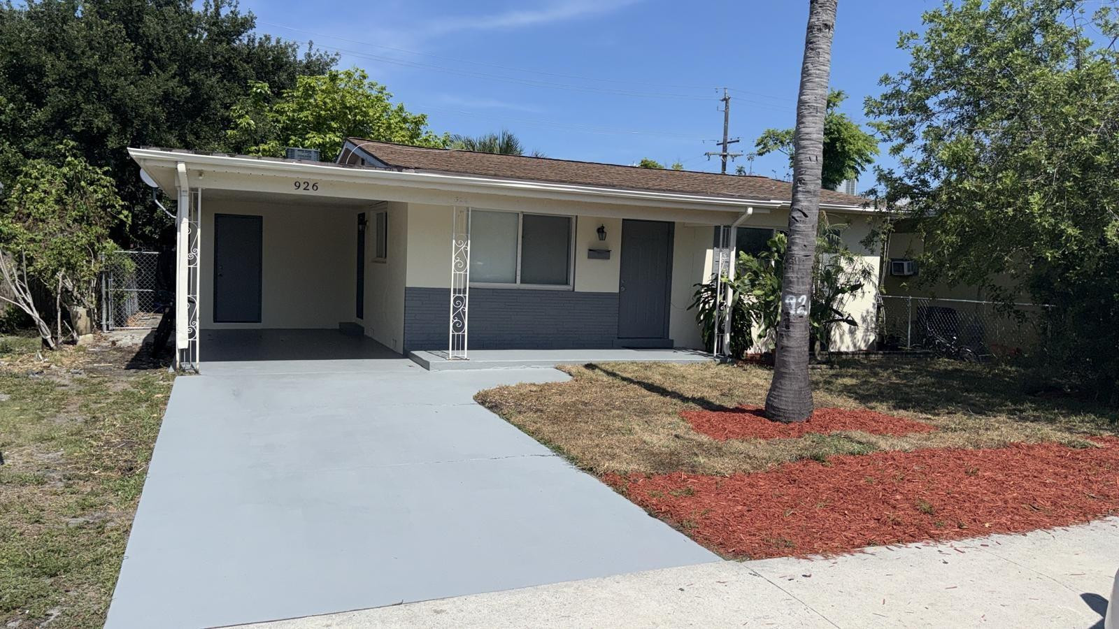 Great 3/2 with porch parking and n in law in the back separated 1/1 possible rental for extra income
