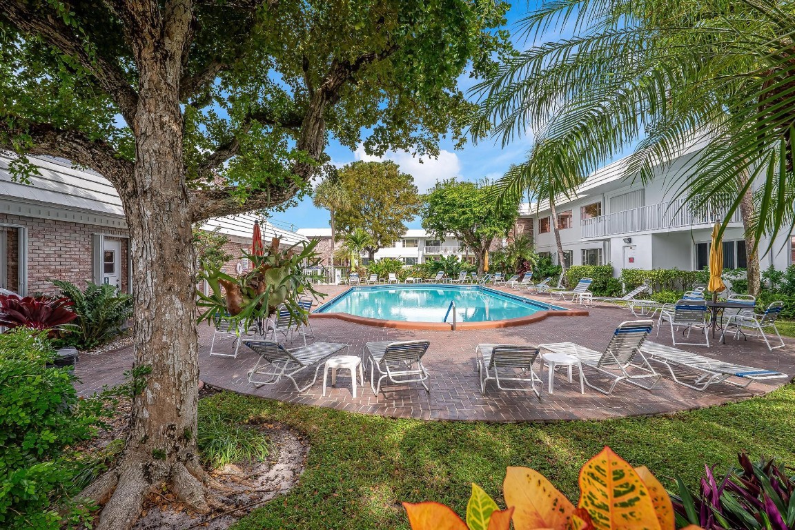 As Soon as You Arrive at this Picturesque Community w/Red-Brick Facade, Lush Grounds, & Paver Pool Deck, You'll Feel Yourself Whisked Away to a Charming, Idyllic World. Make Your Way to Your Gorgeous 2nd Floor Unit, Replete w/Rich Walnut Laminate Floors T/O. Sleek Appliances are Standouts in the Kitchen. Spacious Bedrooms, Sunny Main Bath & Powder Room Round Out the Homey Floorplan. 1 Assigned Pkg Space. New Roof, All Special Assessments Paid. 55+ Active Community w/Social Schedule, Game Nights, Tournaments, Clubhouse, Kitchen, Heated Pool, Cabana Baths. Across from Publix, Dining, Shops, Trendy Pompano Hotspots, 95, Federal, Bus Lines, Beach. Rentals allowed 4 months a year seasonal. NO LAND-LEASE. CASH ONLY.