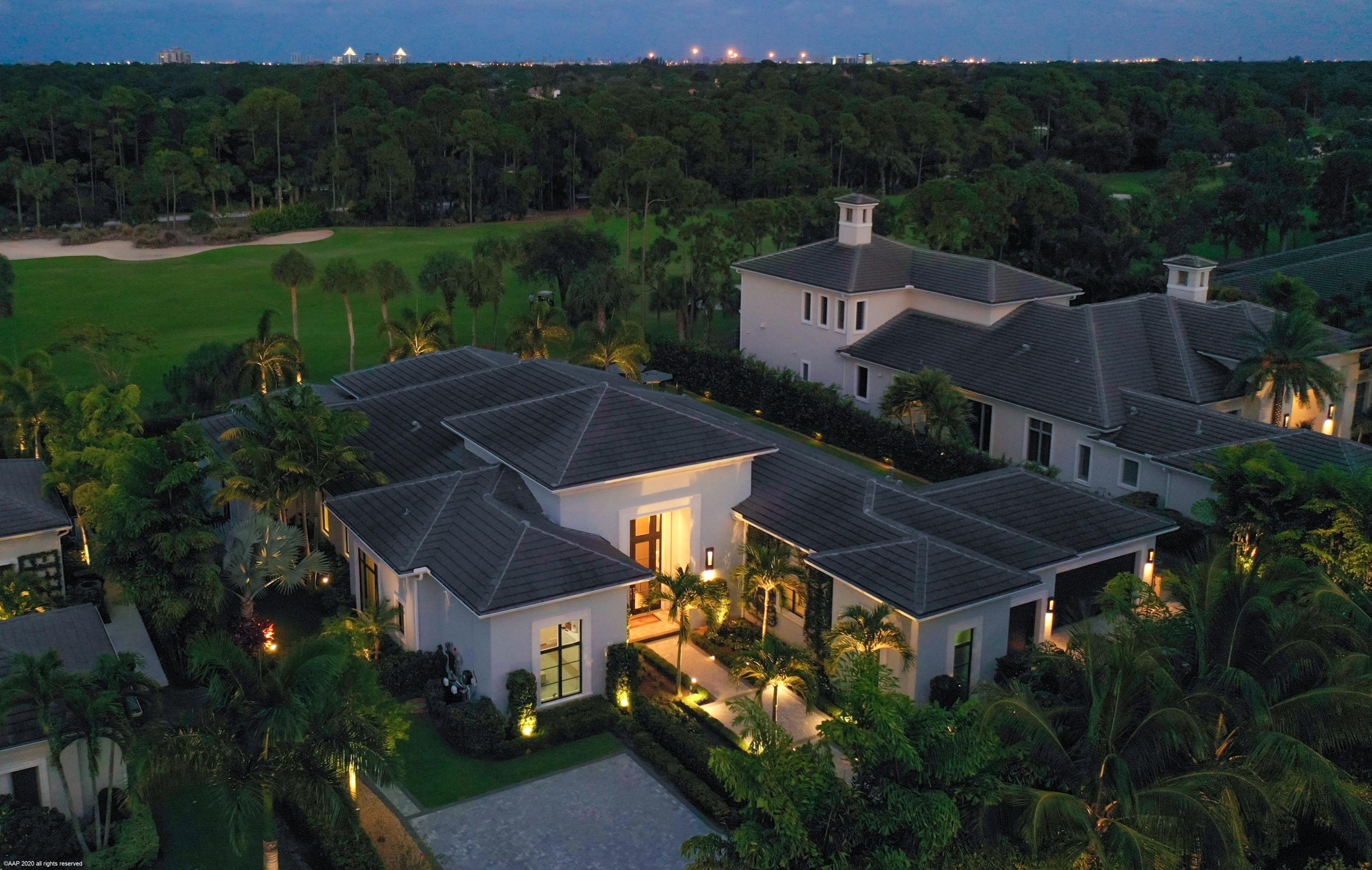 Beautifully appointed custom Hamilton floor plan on stunning half acre home site with vast golf course view.  This impeccable great room plan boasts an open & bright great room with custom built ins & sliding glass doors that pocket in to the wall to create a seamless flow to the patio, pool and back yard. The kitchen is complete with top of the line Thermador appliances, large island with seating, reverse osmosis system, and pantry. The custom temperature controlled wine wall is perfect for a connoisseur's wine collection and spoil your guests in the VIP Suite featuring a luxury bathroom, walk in closet & fully upholstered walls for an added touch.  The master suite is sure to impress, with his & her spa-like bathrooms, with Toto toilets & an outdoor shower, spacious walk in closets, and a sitting area overlooking the pool and golf course.  The Club room is perfect for relaxing and features custom built ins.  Gather with family and friends while barbecuing at the summer kitchen with built in grill on the outdoor patio which also features a gas fireplace and motorized Phantom screens, perfect for entertaining! Other features: electronic draperies, hard wood flooring, whole house generator, Lutron lighting throughout, Crestron automation system, Ecobee thermostats, climate and humidity controlled garage with a large storage area, double washers & dryers in the laundry room, synthetic turf, dog run, salt water pool system, and much more.  This home has it all!