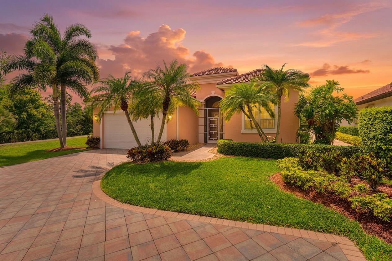 Welcome to this bright and beautifully maintained single-story residence in Ironhorse, offering 2,036 square feet of thoughtfully designed living space with breathtaking golf course views and a serene preserve setting. This three-bedroom, two-bathroom home features a desirable split-bedroom floor plan, providing privacy and comfort for both residents and guests.Soaring ceilings and abundant natural light create an open, airy atmosphere throughout the home, while the renovated kitchen serves as the centerpiece for everyday living and entertaining. The spacious layout flows effortlessly between living, dining, and outdoor spaces, maximizing both functionality and enjoyment. Surrounded by lush preserve views and overlooking the golf course, this property offers a rare sense of peace and privacy. Enjoy quiet mornings, gentle breezes, and spectacular sunset views from your outdoor living areas. The tranquil setting creates a true retreat while remaining conveniently located within the prestigious Ironhorse community.  Additional features include a two-car garage, generous living spaces, and an efficient floor plan designed for comfortable Florida living. Whether you're entertaining guests or simply relaxing at home, this residence offers the perfect blend of natural beauty, privacy, and modern convenience in one of West Palm Beach's most desirable gated golf course communities.