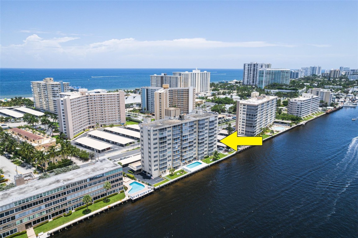 Bring An Offer! Coastal living with DIRECT water views from almost every room. Large CORNER condo, split bedrooms with walk-in closets. Main bedroom has an en-suite bathroom & 2nd bedroom can as well. All windows impact with accordian storm protection on sliders. Sit at the breakfast island in your open kitchen with granite counters & recessed lighting or out on your patio watching the boats go by. Enjoy Happy Hour & cooking out on the 2nd fl rooftop with new friends which extends the length of the building. New AC just installed. Heated pool overlooking the ICW waterway. Sea wall raised & new pool deck & generator for the building. Walk 2 blocks to the new Fishing Village, Pier, Restaurants, shopping, diving, & hotels. Enjoy golf, pickle ball & the amphitheater. Water taxi closeby.