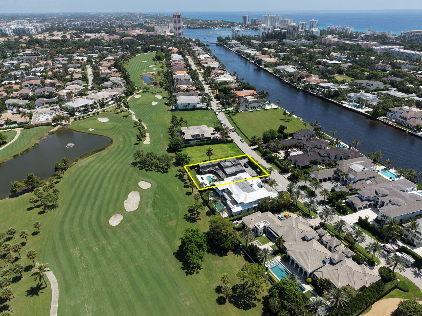 1877 Royal Palm Way presents one of the finest golf course opportunities within Royal Palm Yacht & Country Club. Positioned along 109' of a premier fairway setting with expansive golf views, this exceptional property offers the rare chance to reimagine the existing residence or create a custom estate tailored to your vision. A coveted address, remarkable setting, and exceptional potential combine to make this a compelling offering in one of South Florida's most prestigious communities. Property is being sold As-Is.