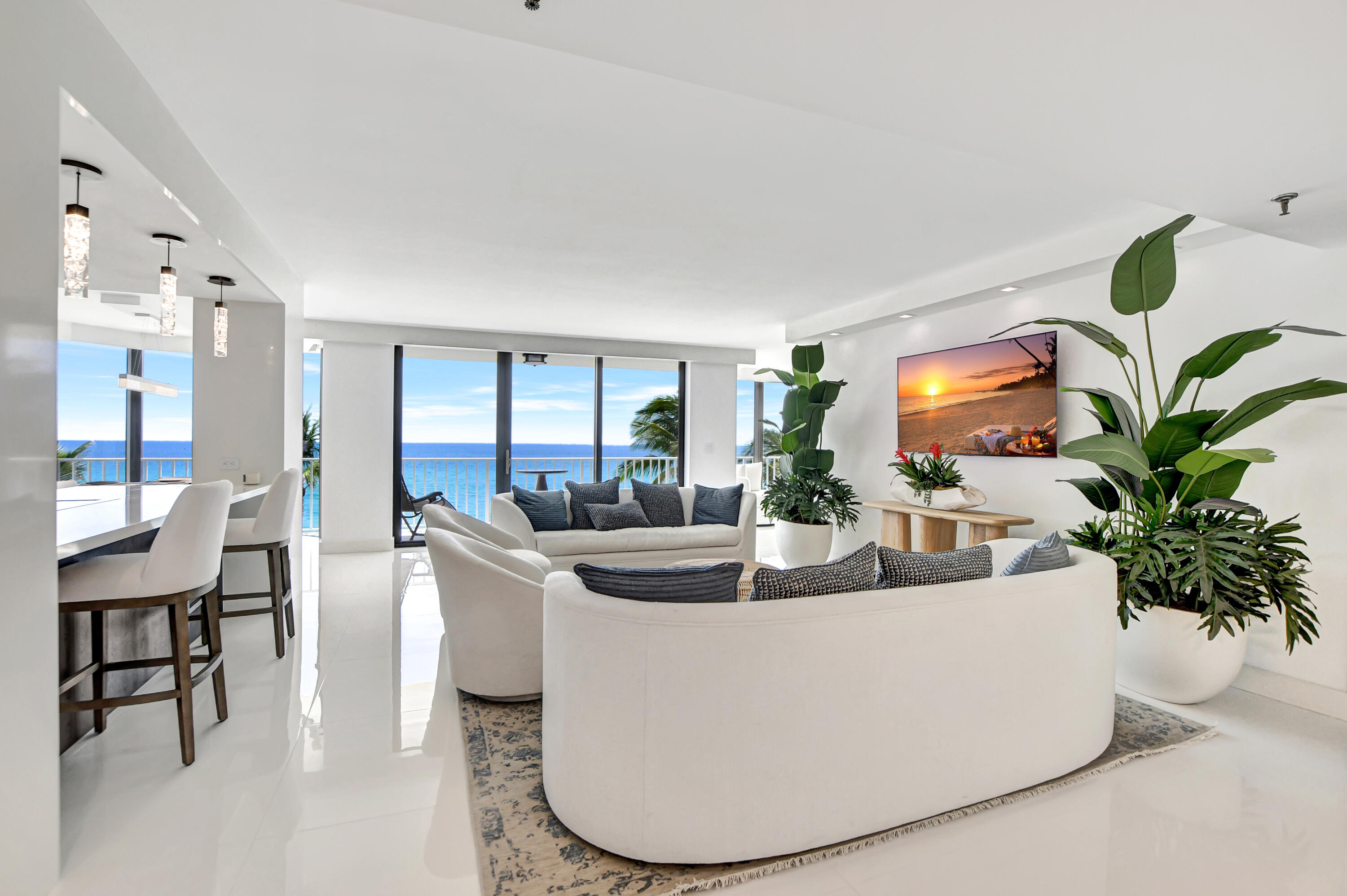 Rare, direct oceanfront views embrace this beautifully updated two-bedroom, two-and- a-half bath residence with a convertible den/office/sitting area.   Trafalgar is located directly on the sand, with optional beach cabanas available during season.  Residents enjoy an intimate oceanfront lifestyle with resort-style ammenities including a fittness center with saunas, pool, hot tub, and exclusive intracoastal-side park with tiki hut and day dock.   Move right in to this turn-key lifestyle...just steps away from the Delray Sands and Lattitudes Restaurant.   A truly rare opportunity to own in one of Highland Beaches' most coveted luxury buildings.    Elegantly renovated hallways and social room add to the value of your new home.