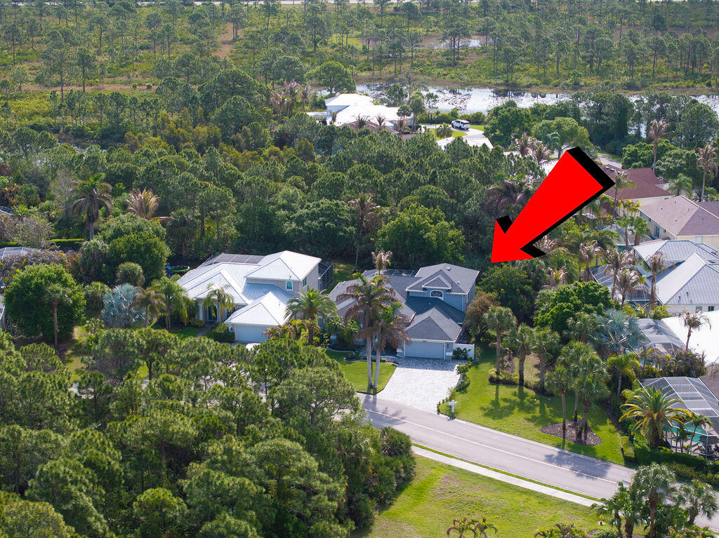Location, location, location! Welcome to your dream home where space, privacy and coastal living come together. This stunning 5 BR, 3 bath residence is ideally located close to shopping and just 4 miles from the beach. Sits on a premium lot backing to a serene preserve with uplands along one side and preserve views in the front. The home features 4 BR on the main level, which includes the primary suite. The gourmet kitchen offers generous counter space and a layout perfect for entertaining. Step outside to your private backyard retreat with a screened in saltwater pool. Upstairs, a BR and large loft create an ideal in law suite or private guest retreat. The extended paver driveway enhances curb appeal and parking. A premium homesite, tasteful upgrades and ample space make this Florida  living at its best just minutes from the beautiful beaches! Roof-2020, Electric Attic Lift installed-2025, Pool resurfaced and retiled-2021, Salt Water System-2024, Dishwasher, Refrigerator, Double Oven and Microwave-2025, Paver Driveway and Extension-2024, Paver Sealant-2026, Hot Water Heater-2025, AC (downstairs unit) 2022
