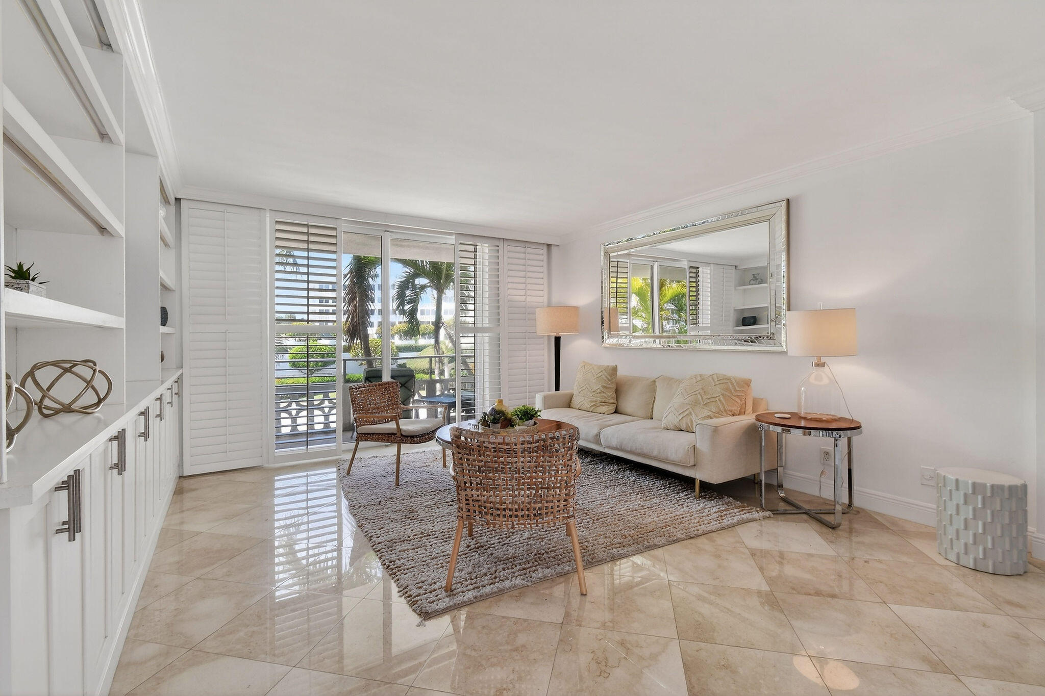 Fully furnished and  renovated 2 bedroom, 2 bath at Ocean Towers South.  Fabulous location near ocean.  Marble floors, plantation shutters, full impact sliders and doors. Tranquil treetop and garden views from the large balcony. Lots of custom built-ins for additional storage. Private beach parcel and very large heated pool. Full time manager, gym, bike storage. Close to shopping, grocery, cafes, many restaurants and the renowned Royal Poinciana Plaza. Concrete restoration complete and no current assessments. Can lease right away, 3 month minimum.