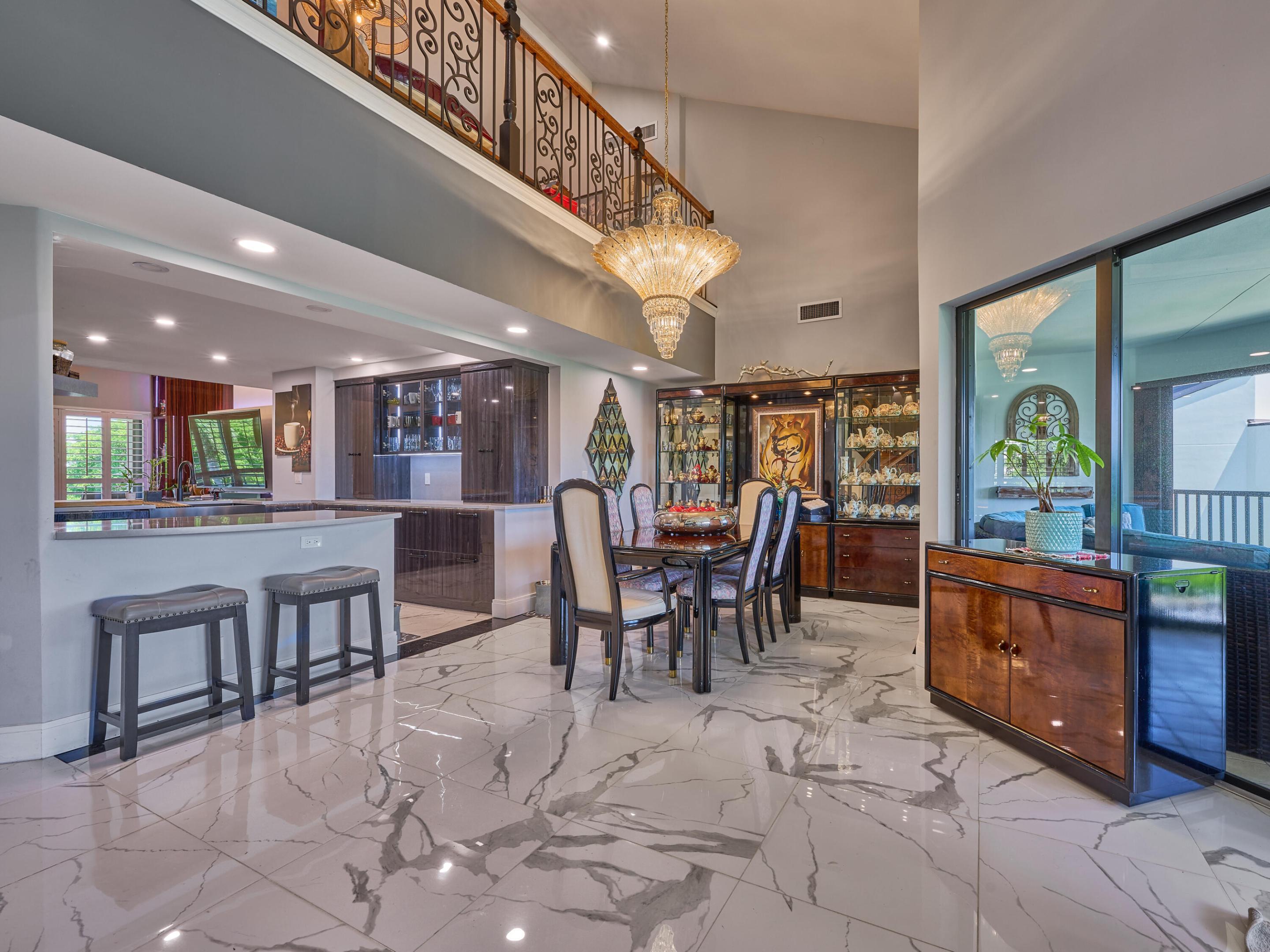 Luxurious Move-in Ready, Fully Updated Waterfront Condo in Harbor Village with one of the best views in Old Port Cove. Spacious 2,706 sf., 3 Bedrooms, 3 Full Baths, + 2nd Floor Loft & Balcony. Beautifully Updated Gourmet Open Kitchen and lots of storage. 3 Large Balconies from every room with amazing views of the community and waterfront. Harbor Village is an ALL ages community and Old Port Cove offers: 24 hour manned gate, premier marina, On-site restaurant, heated community pool & spa, waterfront 2 mile walking paths alongside the water and is pet friendly. Centrally located to Restaurants, Shopping, Minutes drive to Beaches, PBI Airport, Downtown, World Class Golf, & Parks. + North Palm Beach Country Club (Open to the public) for Community Tennis, Pool & Golf. By Appointment Only.  3 Murano Glass Chandeliers do not convey.  Water Heater 2023 Samsung Front Load Washer 2023 Samsung Front Load Dryer 2023 Fisher & Paykel Refrigerator 2023 Whirlpool Microwave 2022 Samsung Oven 2023 Frigidaire Cook Top 2023 KitchenAid Stainless Dishwasher 2023