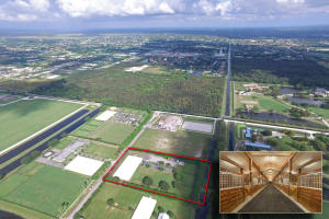 FANTASTIC LOCATION!! HACK TO THE SHOW FROM THIS BEAUTIFUL 5 ACRE FARM WITH 18 STALLS AND ROOM FOR ADDITIONAL STALLS! ESI PREMIUM FOOTING IN EXPANDED MIRRORED ARENA, GROOMS QUARTERS, TACK, FEED, LAUNDR, 5 PADDOCKS, GRASS RIDING FIELD, ROUND PEN, 3 WASH STALLS. Great investment property.