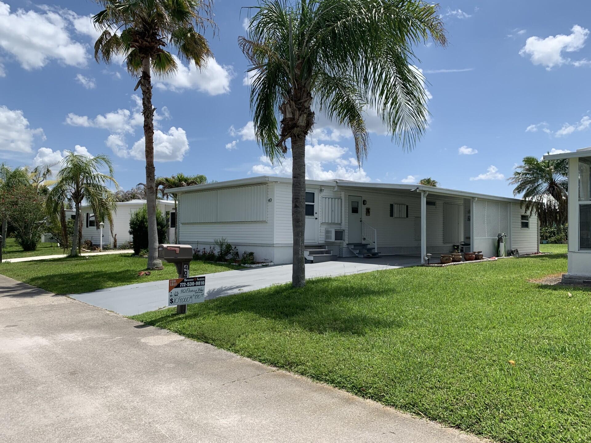 Experience the best of Florida living in this delightful mobile home located in the highly desirable 55+ community of Spanish Lakes One in Port St. Lucie, FL. Featuring stylish vinyl flooring throughout, this residence showcases a beautifully renovated kitchen equipped with brand-new appliances, a sleek modern backsplash, and ample storage space. With 3 spacious bedrooms and 2.5 well-appointed bathrooms, there's abundant space to accommodate guests in comfort. Perfect for both quiet relaxation and lively gatherings, this home offers the ideal blend of charm, convenience, and welcoming warmth.