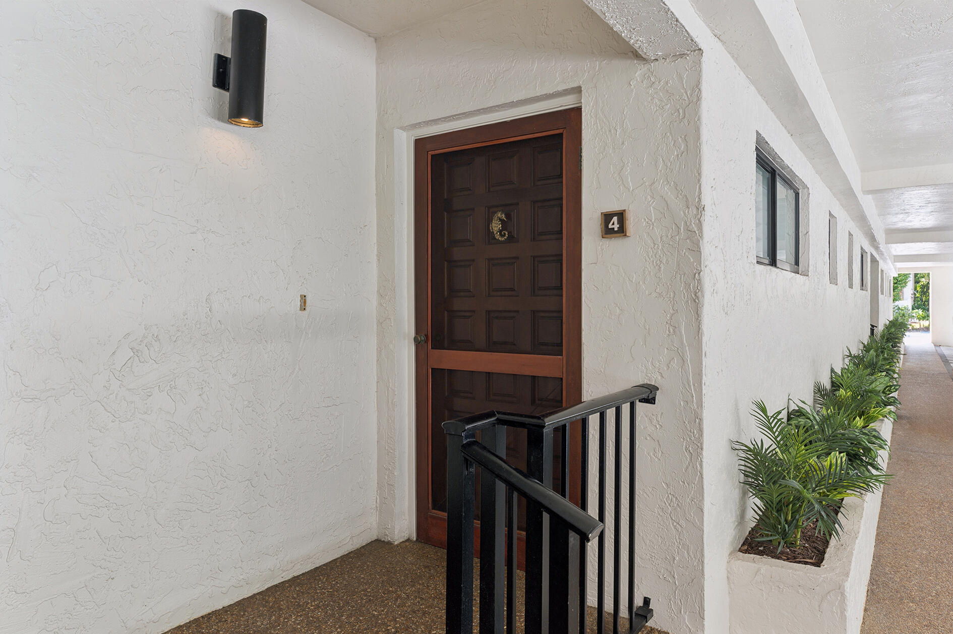 This is a boater's delight. This 3 bedroom, 2 1/2 bath, 2 level townhome with laundry room on 2nd floor is located 1 1/2 blocks from the beach and is situated on a finger canal 50 yards from the Intracoastal.  Dock will accommodate a 36' boat and there is a wonderful deck off the living room overlooking the canal.  The master bedroom has a balcony with fantastic water views. All bedrooms are on the 2nd floor and all are surprisingly large. The main floor has living room/dining room combo, kitchen, foyer, and powder room.