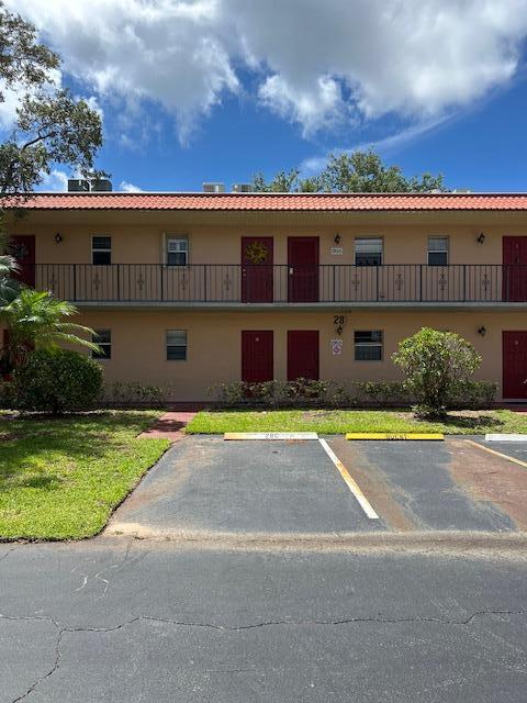 Welcome to MYCC with loads of amenities including UNLIMITED GOLF, water, sewer, cable, wifi, 2 fishing piers, heated pool and more.  This condo is being sold furnished including a piano.  Storm shutter on front window.  Kitchen with updates.  The balcony is glass enclosed plus 2 sliding glass doors  one from the LR and the other one from the bedroom.  Located close to the main clubhouse. View of the golf course and pond.  Come and see everything to appreciate the value. The land lease is included in the monthly hoa