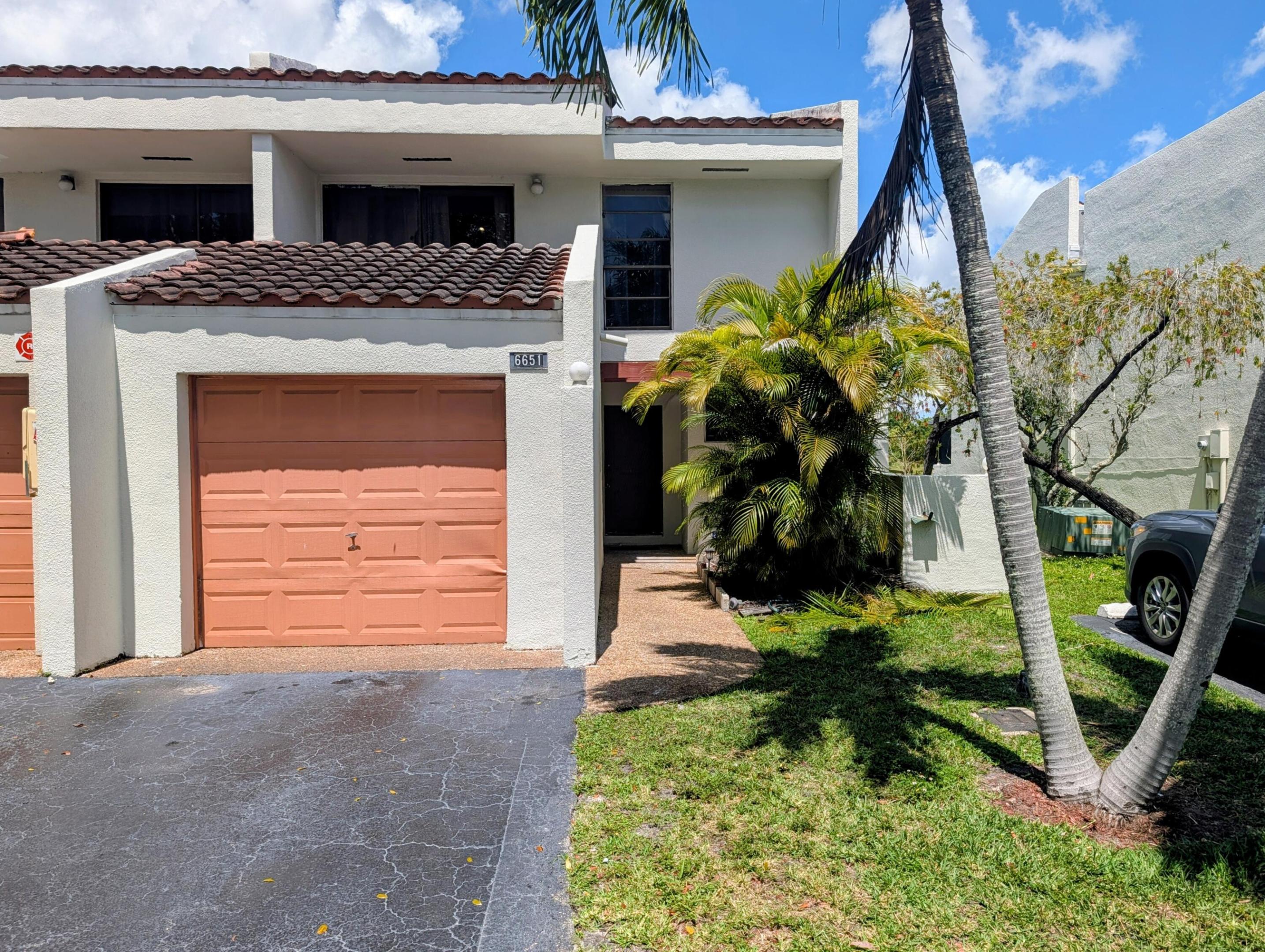 BACK ON THE MARKET! Spacious centrally located townhome in the gated Courts of Inverrary community with stunning water and golf course views. Enjoy peaceful lake views from the screened patio and private balcony off the spacious primary bedroom. The first floor features recently updated tile flooring and a bright open living and dining area. A rare full bathroom downstairs offers added convenience for guests. The garage has been partially converted into a flexible  space perfect for an office, gym, or playroom. New washer/dryer, electric panels and AC ductwork. Community amenities include a pool and fitness center. Great opportunity to own a home with exceptional views and a functional layout.