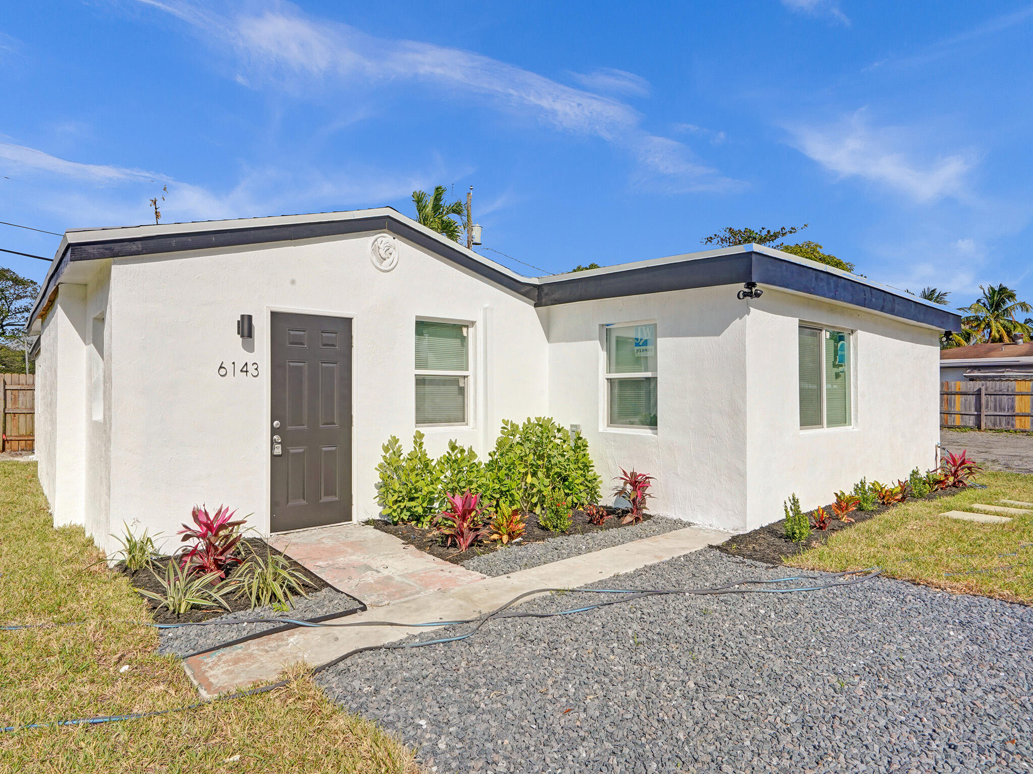 Fantastic short sale opportunity! Stunning 4bd/3ba home in the heart of Miramar. This home has undergone a series of tasteful upgrades, incl durable waterproof vinyl flooring, sleek white kitchen cabinetry, and an exotic quartz countertop complemented by a modern backsplash. Kitchen is equipped with brand-new stainless-steel appliances, incl refrigerator, microwave, and stove. Bathrooms feature designer tile, contemporary vanities, and updated fixtures, all contributing to a refreshed and inviting atmosphere. Efficient ice-cold AC system, tankless water heater, and new window blinds ensure comfort and convenience throughout the home. Newly installed roof, fresh paint inside and out, and ample parking space for multiple vehicles. Home is bright, clean and in absolute move-in condition!