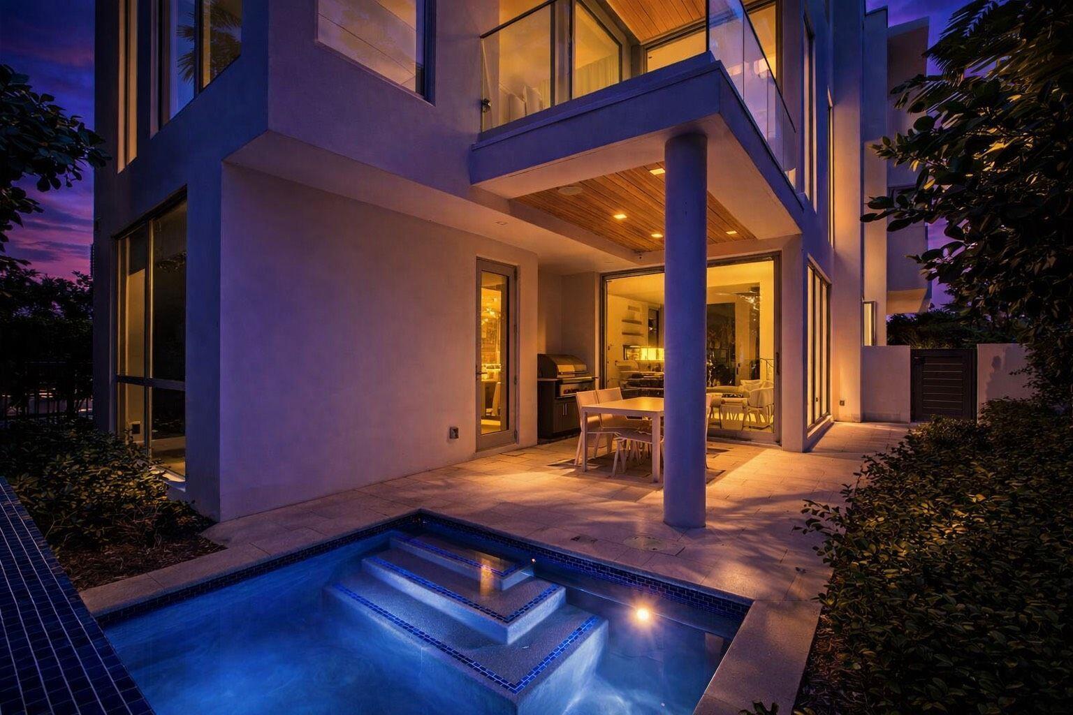 Ever wish you could live "on vacation" 365 days a year?  Recent price reduction by the developer can make your dream come true. Located across Ocean Blvd from a private beach with beneficial beach access rights to that beach this modern design estate home built in 2024 is located between the SEA and the SCENE in Delray Beach .  The Ist floor has a private bedroom for guests adjacent to a club room with a wet bar that opens to the patio and pool area for luxurious frequent entertaining. Walls and hedges on all sides give the property a cozy feeling and enough privacy to consider skinny dipping in the heated and chilled pool if that's what you are into.  A two and a half car garage and enough parking space in the driveway for 4 more cars means ample parking for guests. Speaking of the main living area you will enjoy the spacious open area with high ceilings a kitchen that needs to be seen to be believed with top notch appliances by Subzero, Wolf etc, an island as big as most people's kitchens and enough cabinet space to store food for an army let alone multiple sets of grandmas tableware that you can't bring yourself to get rid of ! The third floor has 3 bedrooms each with a full bath. The primary bath has a huge designer Bathtub and separate shower. The bedrooms have balconies where you can relax and enjoy the morning coffee you just grabbed from the centralized coffee bar. High efficiency "heat pump" heating and cooling keeps utility costs under control and the lighting and audio is on Control 4 automation system.  A 1.5% developer's fee will be charged at closing.