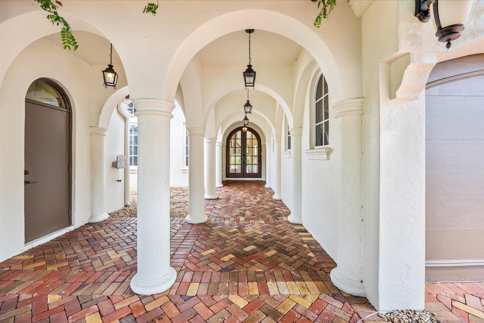 An arched entryway with columns designed to catch the breezes & the eye invites you into this elegant Spanish Revival home. The 24-foot-high ceiling & wall of storm-proof windows in the Living room are sure to impress the most discerning guest. The great room, dining, living, office, & owner's suite are all on the first floor. The owner's suite has access to the pool & features double closets with custom shelving. The junior owner's suite, loft, & bedroom suites 3 & 4 are on the second floor, with a large balcony overlooking the pool & the Palmer 5th Green. The office has views of a private garden. The covered back porch, with an artisan-designed pool/spa, creates a fantastic space for entertaining. Tesoro is a gated golf community, and membership is not required.