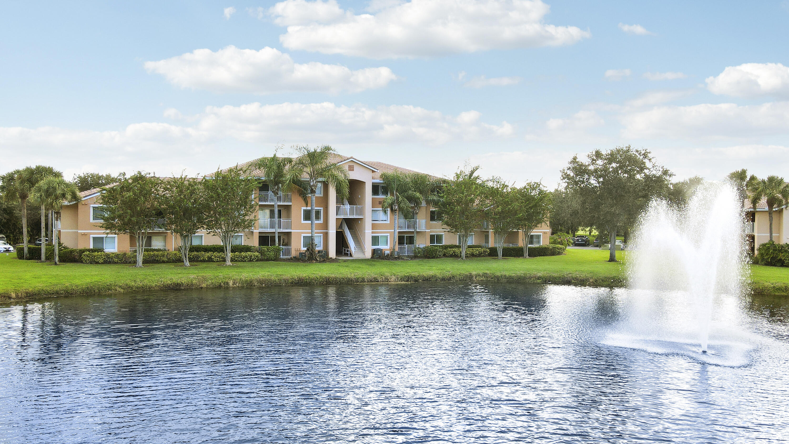 Beautifully updated 2-bedroom, 2-bath third-floor condo in the highly desirable Club at St. Lucie West. This move-in ready unit features fresh interior paint, brand-new laminate flooring, and high vaulted ceilings, creating a bright and open living space with an airy feel.  Enjoy serene lake views from your private living area—perfect for morning coffee or relaxing at the end of the day. The third-floor location offers added privacy along with abundant natural light.  The community has recently been freshly painted and features a brand-new roof, offering added value and peace of mind. Ideally located near shopping, dining, and major highways, with great amenities in a well-maintained setting. Excellent opportunity for both homeowners and investors.