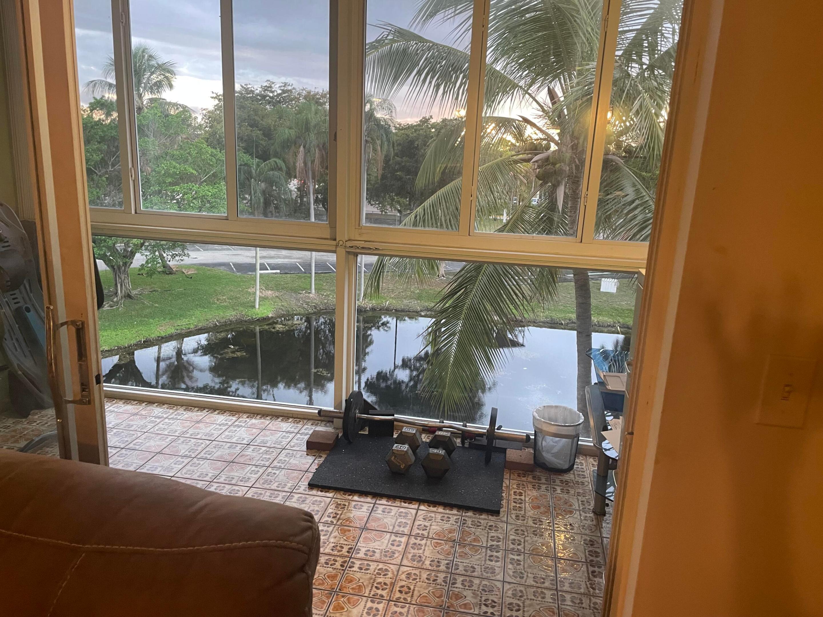 LOTS OF SPACE IN THIS TOP FLOOR 2/2 WITH IMPACT WINDOWS AND BEAUTIFUL VIEW OF LAKE AND GARDEN; REMODELED BATHROOMS; EASY TO SHOW; MOTIVATED SELLER; INVESTORS WELCOME INVESTORS WELCOME; OWNER MOTIVATED; EASY TO SHOW