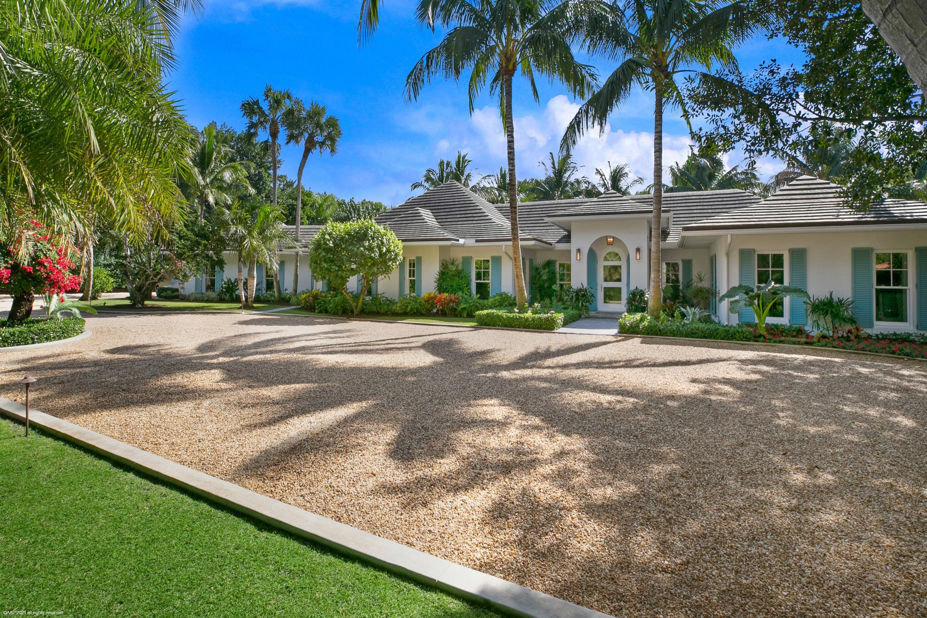 102 Bassett Creek Trail is a completely renovated Bermuda style house that has it all! Situated on 1.1 acres, this beautifully landscaped home has golf course and Intracoastal views. Features include a luxury master suite with his and her baths, glass sunroom, beautiful family kitchen with fireplace, oversized lap pool, attached 2-car garage plus a separate guest house with large living/cabana room. This house is in perfect condition and a must see!