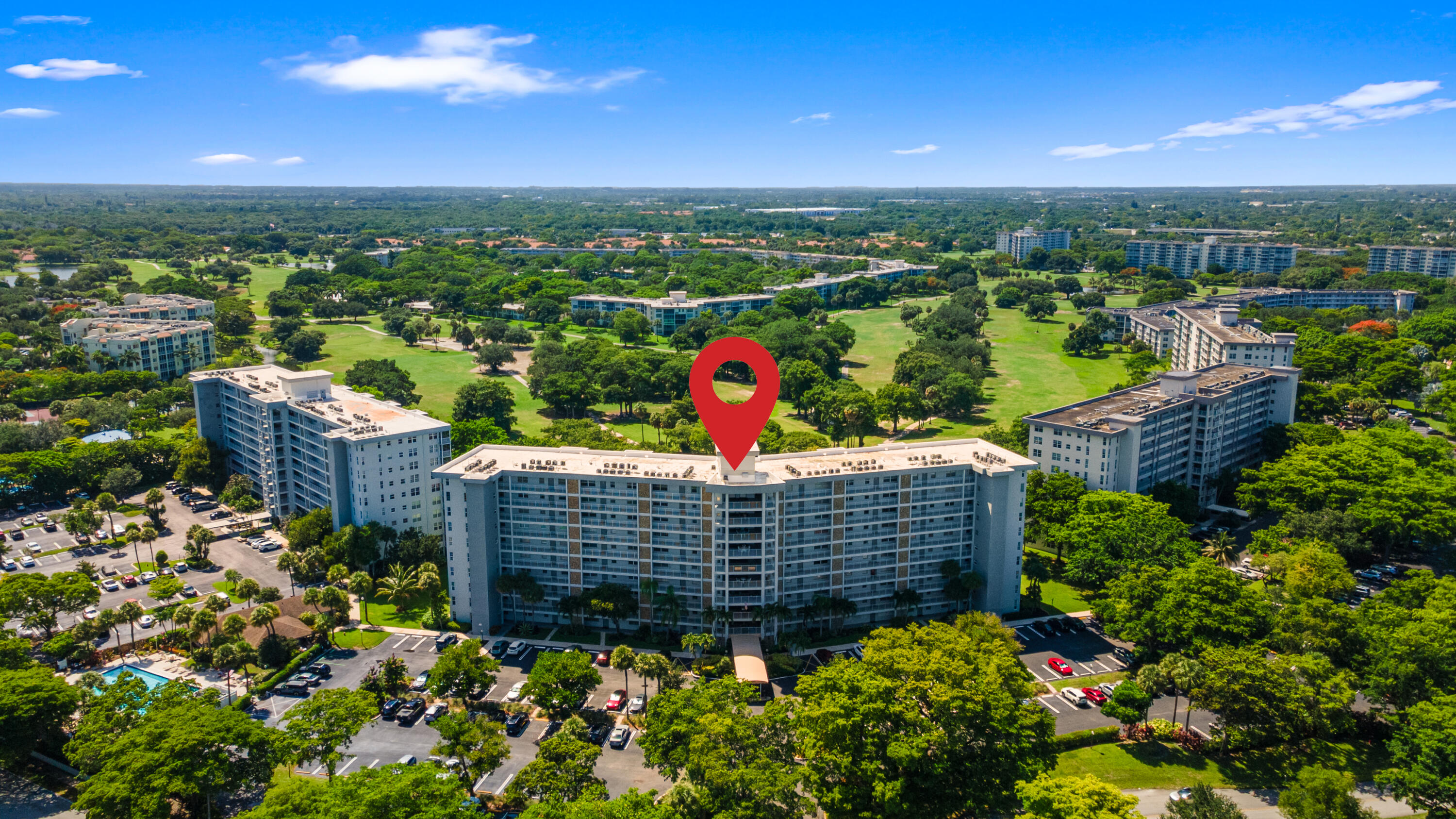 Spacious 2 BD, 2 BA condo overlooking the golf course in desirable Palm-Aire! This beautiful residence features cherry hardwood flooring throughout, an updated kitchen with granite countertops, newer stainless steel appliances, pantry, full-size washer and dryer, and a sunny breakfast nook. The open living and dining areas flow seamlessly to a screened balcony with tranquil Oaks Golf Course views. Both bedrooms feature ensuite bathrooms, ideal for guests, while the primary suite offers a generous walk-in closet. Both bathrooms showcase renovated showers with frameless glass doors. Additional features include extra storage, secure lobby entry, and access to resort-style amenities including a pool, clubhouse, library, tennis, pickleball & basketball courts. Conveniently located near shopping dining, beaches, and major highways.  No leasing the 1st year of ownership. HOA requires 700 credit score. No pets except registered service animals per HOA.