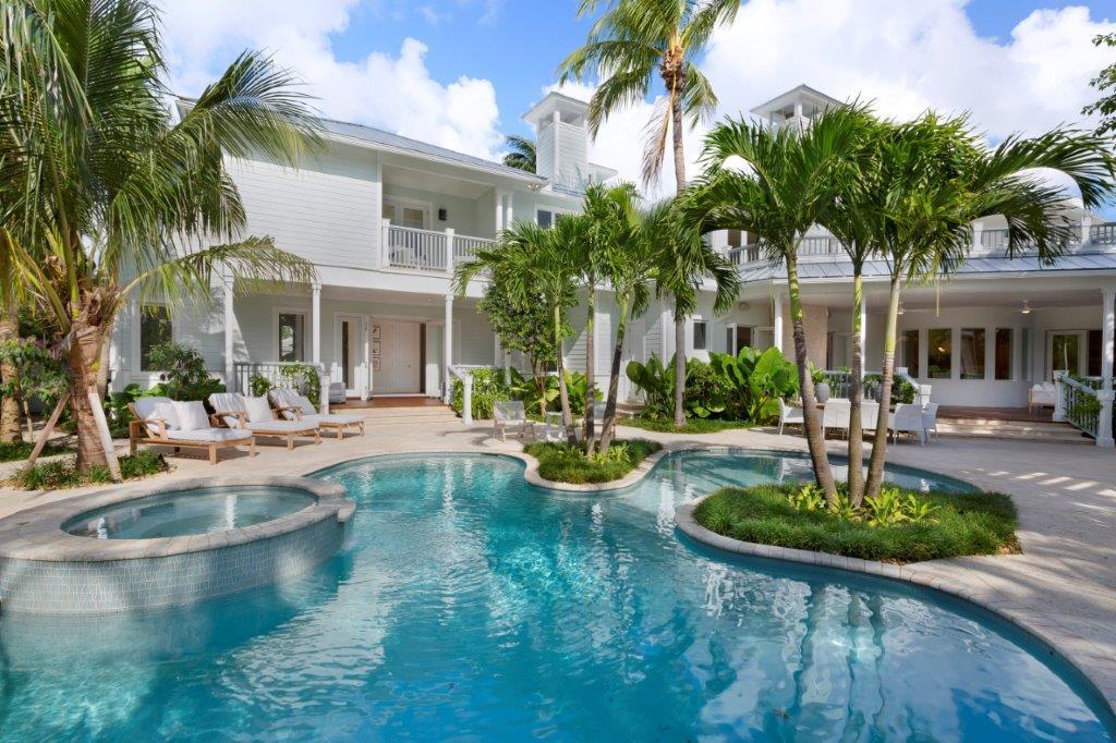 Newly renovated by acclaimed Seaside Builders and Leighton Design Group, this picture-perfect estate in alluring beachside Seagate gives a chic modern twist to relaxed island style. Wide-plank wood floors ground the calm sand-toned palette. Sleek fireplaces highlight airy living spaces inside and outdoors by the lagoon-inspired pool in a lush resort-like oasis. Family rooms and luxe master suites are on both levels. The information herein is deemed reliable and subject to errors, omissions or changes without notice.  The information has been derived from architectural plans or county records. Buyer should verify all measurements DISCLAIMER: The written and verbal information provided including but not limited to prices, measurements, square footages, lot sizes, calculations and statistics have been obtained and conveyed from third parties such as the applicable Multiple Listing Service, public records as well as other sources. All information including that produced by the Sellers or Listing Company are subject to errors, omissions or changes without notice and should be independently verified by any prospect for the purchase of a Property.  The Sellers and Listing Company expressly disclaim any warranty or representation regarding all information.  Prospective purchasers' use of this or any written and verbal information is acknowledgement of this disclaimer and that Prospects shall perform their own due diligence.  Prospective purchasers shall not rely on any written or verbal information provided when entering a contract for sale and purchase.  Some affiliations may not be applicable to certain geographic areas. If your property is currently listed, please do not consider this a solicitation. In the event a Buyer defaults, no commission will be paid to either Broker on the Deposits retained by the Seller.  "No Commissions Paid until Title Passes."  Copyright 2018 Listing Company. All Rights​​‌​​​​‌​‌​​​‌‌​​​‌‌‌​​‌​​‌‌​​​​ Reserved.