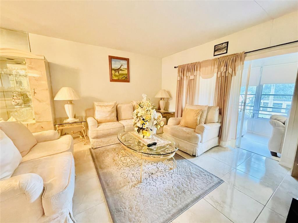 Well maintained 2BR/2BA corner unit in the desirable 55+ community of Oriole Gardens. This residence offers a generous living area that opens to an enclosed patio—perfect for relaxing or entertaining. Tile flooring throughout, updated bathrooms for added comfort, stainless steel appliances, A/C (2022) and water heater (2025). Ideally located near shopping, dining, and major highways for easy commuting. Residents enjoy amenities such as a clubhouse with pool, large auditorium, game room, library, and fitness center. No pets! A wonderful opportunity to create your ideal Florida retreat!Don’t miss this exceptional opportunity—schedule your private showing today!