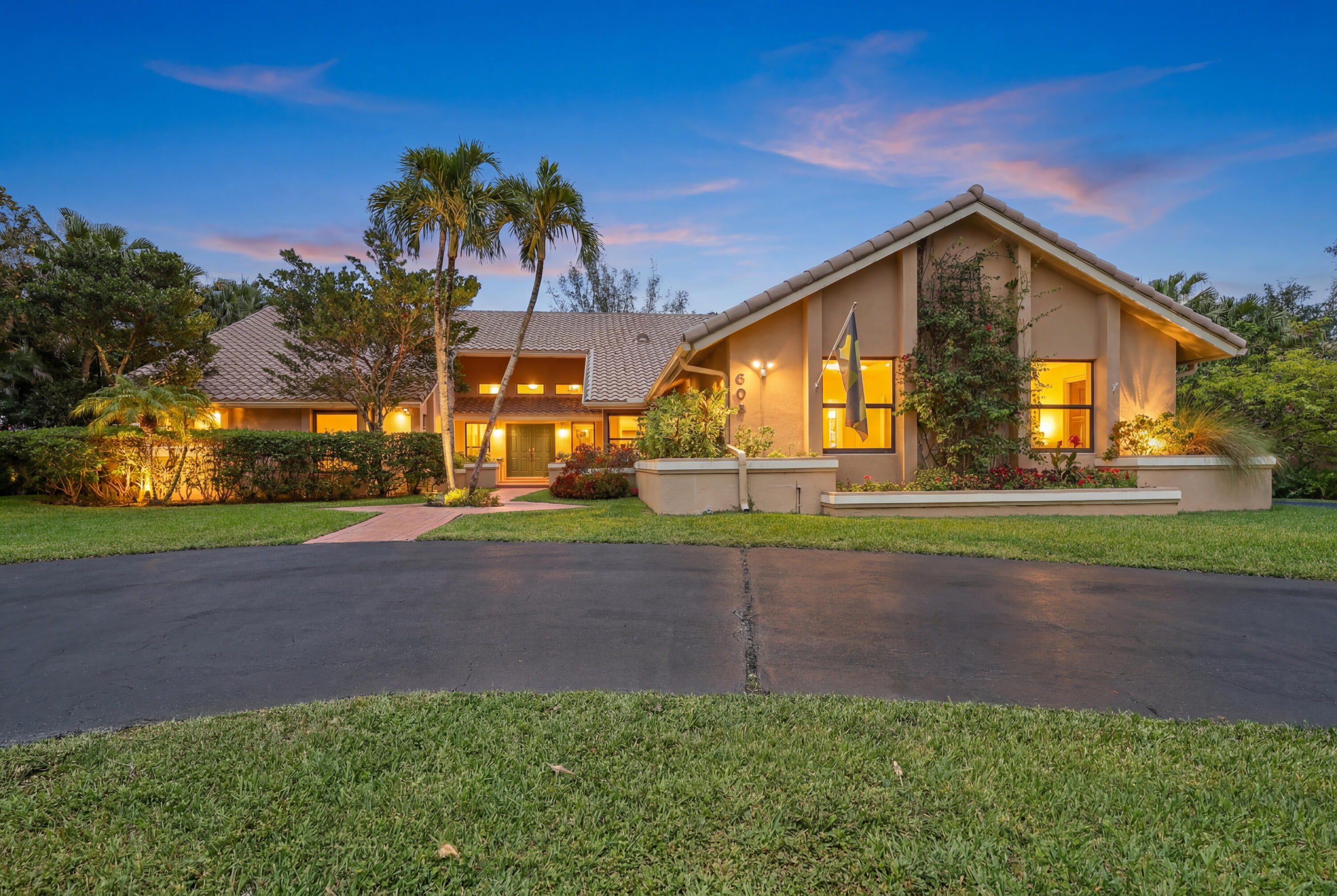 Located on a private 1.09-acre lot on a dead-end street in Parkland's Pine Tree Estates, this 5BR/4BA home offers privacy, space, no HOA. Featuring over 3,700 sq. ft. of living space, soaring vaulted ceilings, travertine floors, partial impact windows, partial accordion shutters, a 3-car garage, oversized circular driveway with parking for boats, RVs, trailers,multiple vehicles, plus an upstairs loft suite w/ private bath. Enjoy a heated screened pool, covered patio, outdoor kitchen (2020) Equestrian-friendly property includes a 2 stall barn with electric,water. Recent updates include two water heaters (2026), pool pump, well pump (2023), and sprinkler system. Zoned for Parkland schools,this rare acre-plus estate offers country living with city convenience.  Professional photos coming soon.