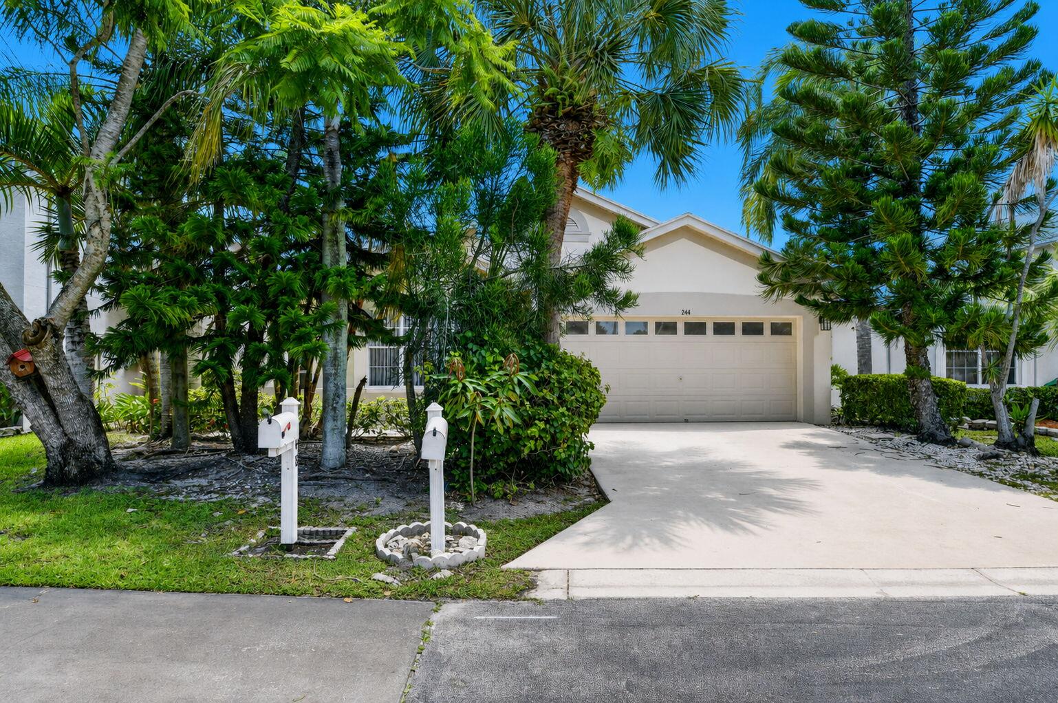 COME AND CHECK OUT THIS 3 Bedroom, 2 Bathroom POOL home in the desirable River bridge community located nearby from Downtown West Palm Beach and the beaches. This home features an open floor plan with Vaulted ceilings, Fully screened in Pool w/ Jacuzzi, Central Vacuum system, New SS Kitchen Appliances, New Washer & Dryer, New quartz Kitchen & bathroom Countertops, New Luxury Vinyl Plank throughout, Fireplace, freshly painted, Epoxy garage floors, new blinds, and SO MUCH MORE. This home is located in River Bridge with Spa-like amenities like Pool, Jacuzzi, Tennis court, playground, Gym, Billiards room, clubhouse, and SO MUCH MORE.