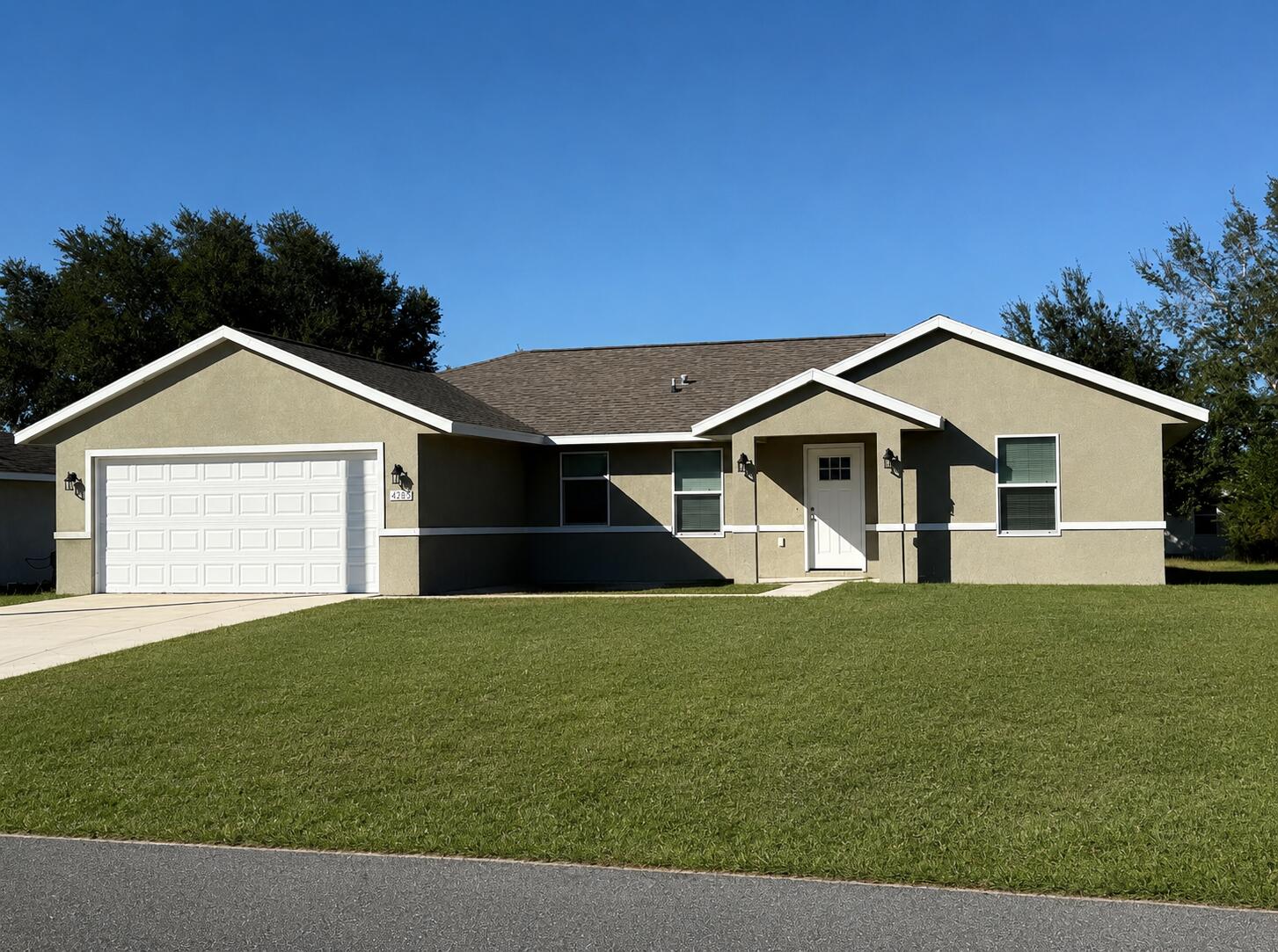 Welcome to your almost-new home in the highly desirable community of Marion Oaks! This immaculate, newly constructed single-family residence (2023) features a solid concrete block structure, offering a modern and functional floor plan with 3 spacious bedrooms, 2 full bathrooms, and an attached 2-car garage across 1,508 total sq. ft. Situated on a generous 0.23-acre lot complete with an integrated irrigation system, the property comes equipped with central air conditioning, public sewer access, and essential appliances (washer and dryer included). Best of all, you can enjoy total freedom with no HOA fees or restrictions ($0). Don't miss this exceptional, move-in-ready opportunity in one of Ocala's fastest-growing areas.