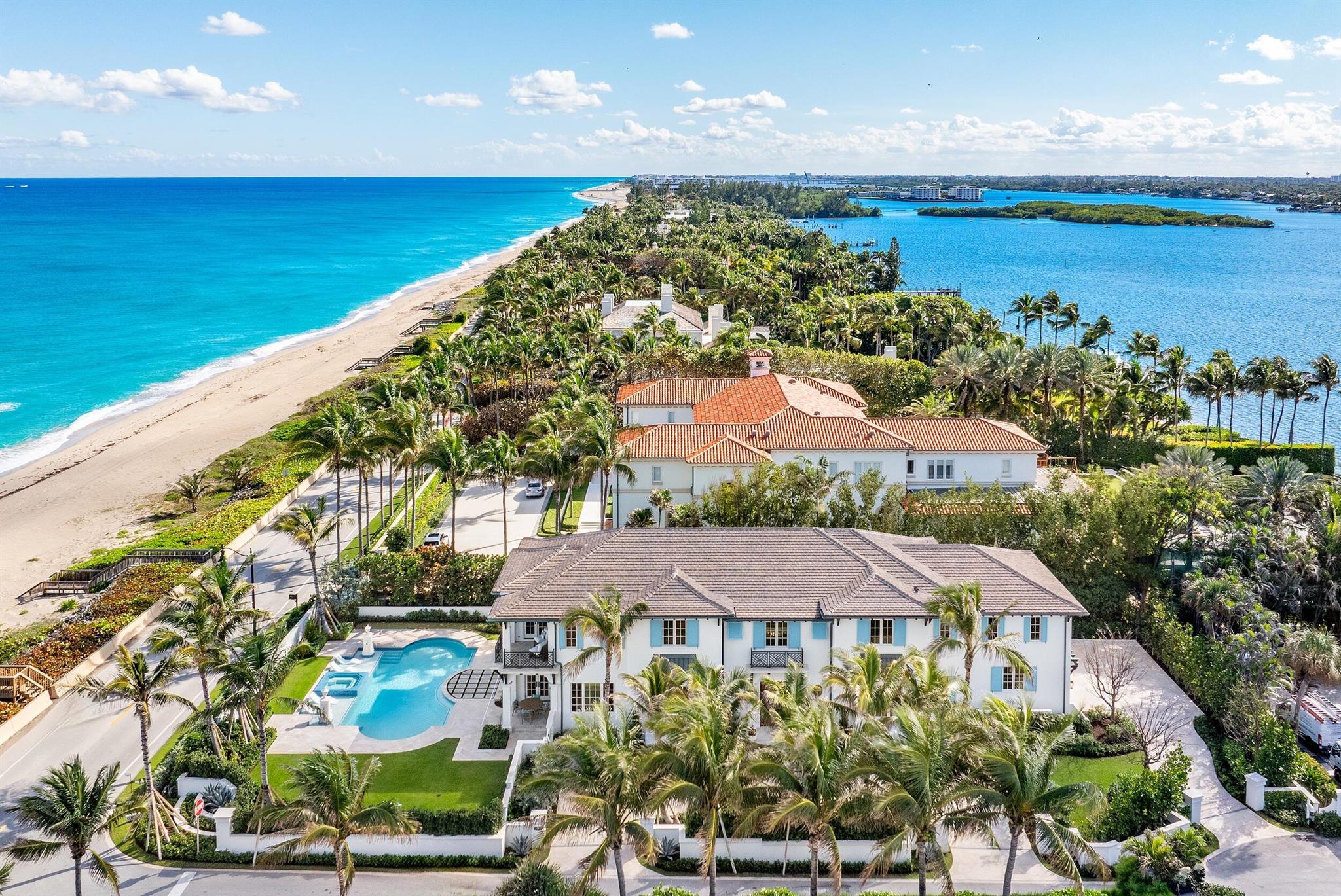 Spectacular, Newly Built Oceanfront Estate with 6 bedrooms, 7 full baths, 1 powder room, and sweeping views of the Atlantic Ocean. This immaculate British West Indies home features beautiful finishes throughout including stunning hardwood and marble flooring, detailed ceilings, and exemplifies the highest standard in craftsmanship and attention to detail. Welcoming foyer leads to the formal living room with gorgeous, beamed ceiling. Chef's kitchen with top-of-the-line appliances, large U-shaped island with seating for 6, and breakfast area with peeks of the ocean. Additional interior highlights include formal dining room, light-filled family room, and office with floor-to-ceiling built-ins. Elegant, oceanfront Primary Suite features sitting room, dual bathrooms, and dual walk-in closets. Fabulous outdoor spaces include multiple covered loggias and balconies, meticulously landscaped grounds, and large pool with spa. Located in Palm Beach's Estate Section, just minutes from the renowned shopping and dining of Worth Avenue and the ever-growing Downtown West Palm Beach.