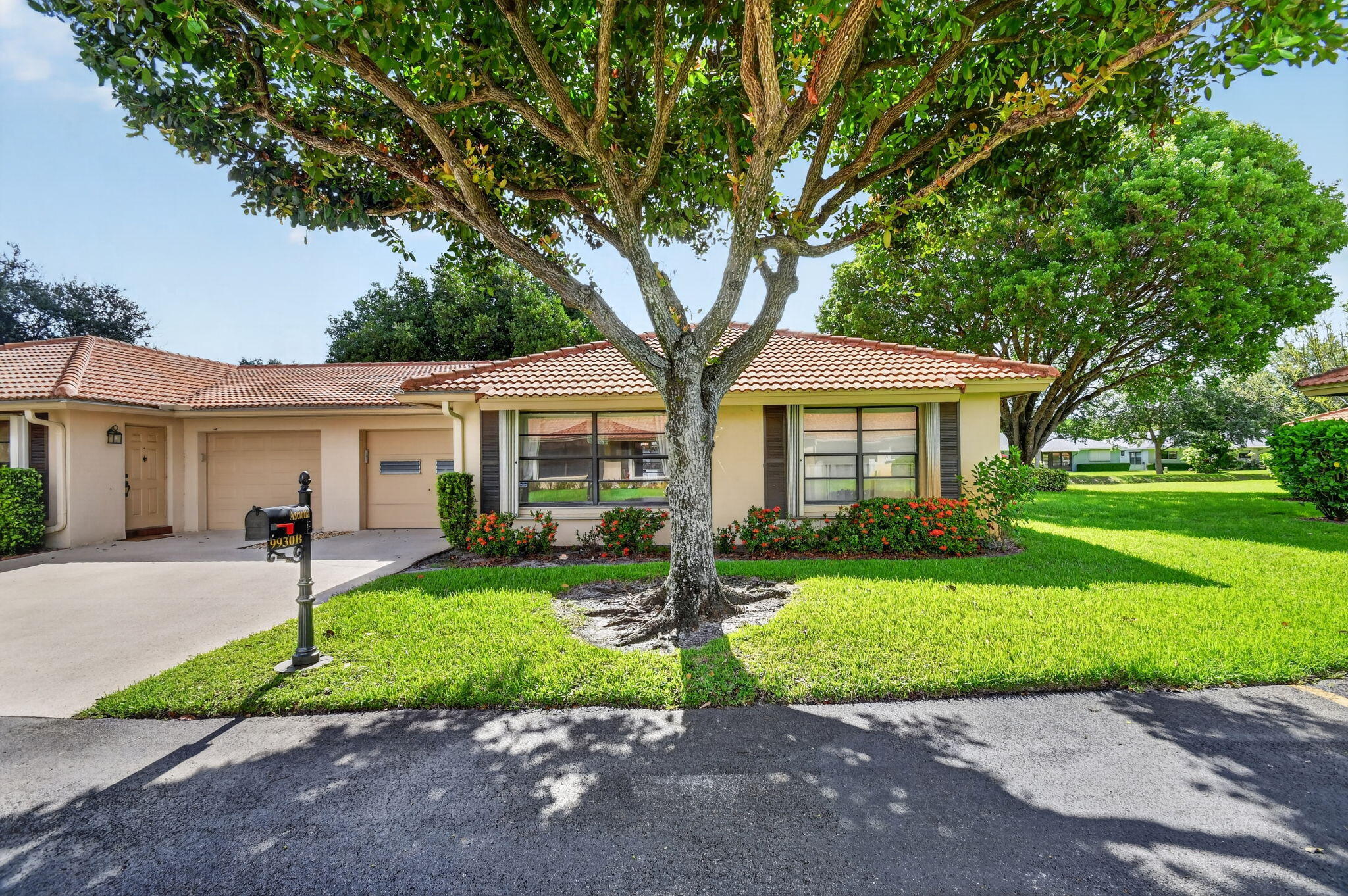 Welcome to Bent Tree Villas West! This charming 2-bedroom, 2-bath villa with an attached garage offers the perfect combination of comfort, convenience, and easy Florida living. Situated on a desirable corner lot at the end of a quiet dead-end street, this home provides added privacy and a peaceful setting. Inside, you'll find laminate and tile flooring throughout the main living areas, along with an enclosed Florida room that offers additional space to relax, entertain, or enjoy your morning coffee. Bent Tree Villas West is a vibrant active adult community featuring a clubhouse, swimming pool, library, and a full calendar of social activities and clubs, making it easy to stay active and connected with neighbors. The HOA fee includes water, sewer, trash removal, basic cable and roof,  exterior building maintenance, and landscaping, providing a low-maintenance lifestyle with exceptional value. Ideally located near shopping, dining, entertainment, and major medical facilities, this move-in-ready villa is a wonderful opportunity to enjoy all the benefits of South Florida living in a welcoming community.