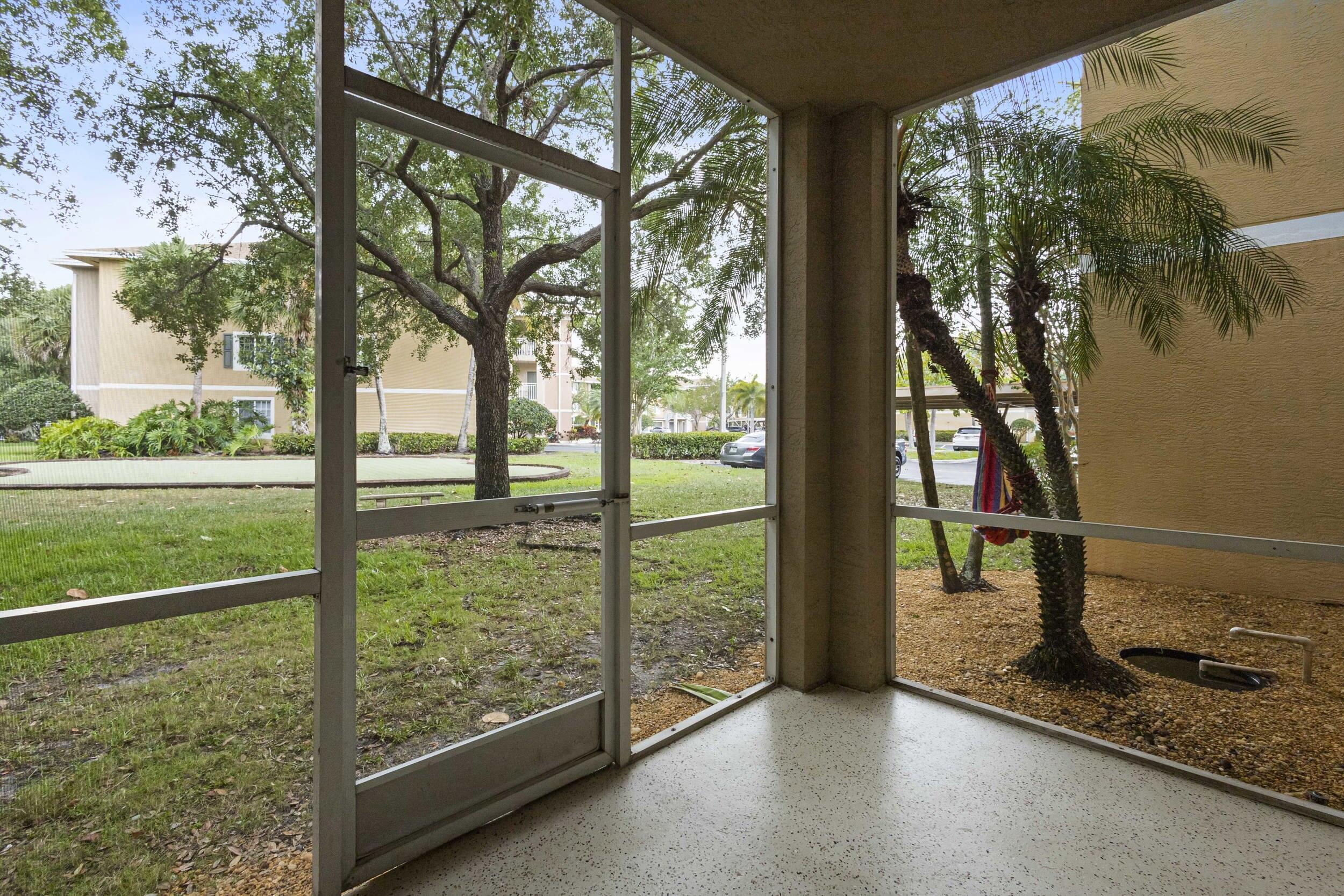 Fantastic location with open landscaping view from the first floor. Garage which leads by corridor to your covered condo entrance plus an additional open parking space. Replaced AC system and water heater. Luxury gated community. Immaculate landscaping. Hurricane resistant building specs, impact windows, no shutters required. Not a flood zone. 2 resort pools with hot spas. 2 clubhouses with gyms, business center, billiards, lounge, etc. Tennis, golf putting green, meditation area with waterfall. Picnic areas throughout with BBQ's. Surrounded by the Emerald Dunes golf course. Upgraded floor tiles throughout. New plank vinyl flooring in all three bedrooms. Walk to restaurants and shopping. Minutes to the Turnpike. **ZERO Last Month Deposit required!**