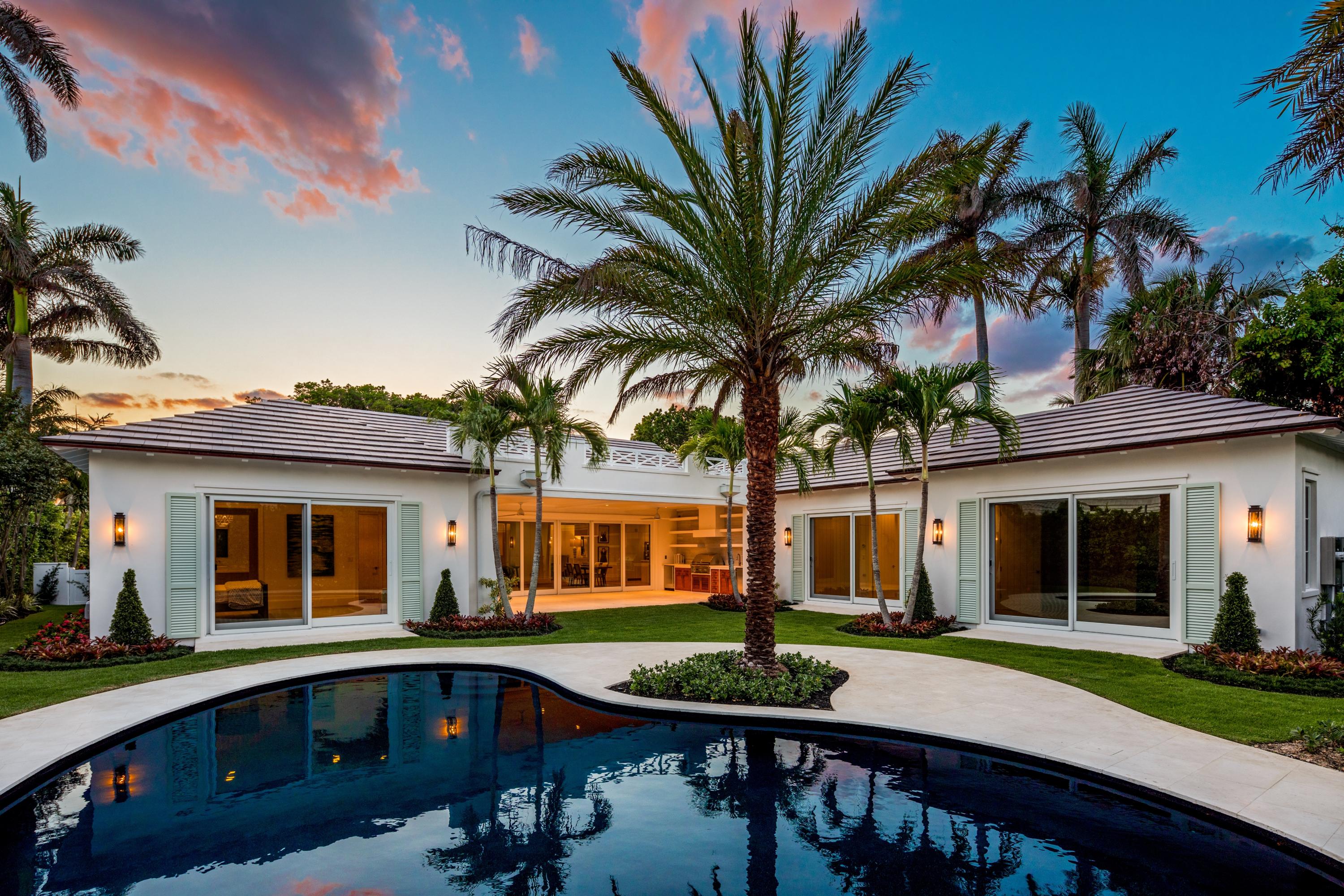 Sensational new chic Bermuda style home sited on one of the highest elevations in the heart of Gulf Stream, only moments to deeded beach access and Gulf Stream School, affords today's sophisticated buyer the opportunity to enjoy the Florida lifestyle. Designed with a judicious use of space featuring over 4,753 Total Square Feet, this irresistible four bedroom three and one half bath home with hardwood floors throughout, opens to reveal floor to ceiling windows and doors which bathe the interiors in natural light. The grand living area features vaulted ceilings with white tongue and groove cypress interior walls and glass doors, which open juxtaposing the outdoors with inside space creating a feeling of the past with a look of today. The kitchen features Thermador appliances complete with built in coffee center, induction cooktop, custom Italian cabinetry and eat in island. Relax as if in a dream in the luxe poolside master suite with his/her closets and a spa like master bath surrounded by soft color glass mosaic tile and elegant fixtures to create the perfect Zen like space.  The outdoor loggia makes for the ideal entertaining area with beamed white washed tongue and groove cypress ceilings and an outdoor kitchen. Lush tropical landscaping surrounds the large pool with a coquina stone sun deck.  All of this and more were just completed for you to enjoy now.  Near the dazzling shops and renowned beaches of Delray, Palm Beach and Boca Raton...This is what you have been waiting for!