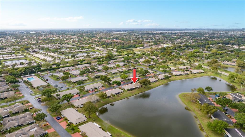 This well-maintained 2-2 villa is located in the beautiful community of Whisper Walk in Boca Raton. This home features high ceilings, a laundry room, a two-car driveway, a hurricane-impact front door, and two bedrooms, each with a full bathroom. The kitchen appliances, water heater, and A/C unit were replaced in 2016. Enjoy your morning coffee from the screened patio, which overlooks a serene lake. Whisper Walk is a gated community in western Boca Raton and offers many amenities, including eight tennis courts, two pickleball courts, a heated pool, a clubhouse, and exercise and billiard rooms. The maintenance covers basic cable, water, sewer, lawn maintenance, common areas, and amenities. The association requires 20% down when submitting the application for purchase.