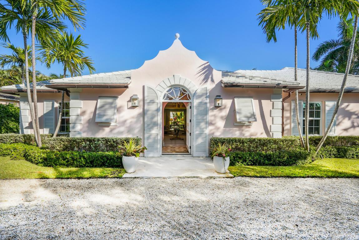 This incredibly chic Bermuda-style home is truly move-in ready. Completely renovated and reimagined in 2018 by renowned architects Richard Sammons and Anne Fairfax, the residence blends timeless elegance with modern comfort. Offering 3 bedrooms, 3 full baths, and 2 half baths, the home is filled with exceptional design details: natural coquina stone floors throughout, pecky cypress beams in the dining loggia, a soaring tray ceiling in the living room, and multiple sets of French doors that open to lush gardens and sunlit terraces. Bathed in natural light, the home's open, modern flow makes it ideal for effortless entertaining. Outdoors, a series of inviting terraces, including a covered terrace overlooking the pool creating a serene tropical escape.
