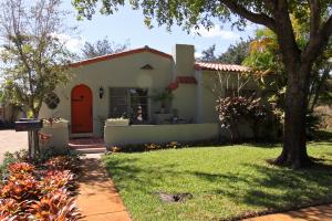 Charming Flamingo Park Mediterranean style residence designed by noted local architect Hansell Hall. Consisting of a main house with 2 bedrooms, 1 bath and a 1 bedroom 1 bath mother-in-law suite which could easily be converted back so the main house is a  large 3/2. Plus a detached garage and a large 1br/1bth apartment. All on a triple lot with space to spare, this sweet home offers the best of all worlds. The main residence has timeless 1920's charm and is built out of hollow tile! Hardwood floors compliment the original architectural details of this home with arched cypress doors, fireplace, formal living and dining rooms, charming kitchen with tiled counters and pine cabinets. Plenty of room for a pool and gardens. Plus a 2 car garage & a Palm Beach stone driveway