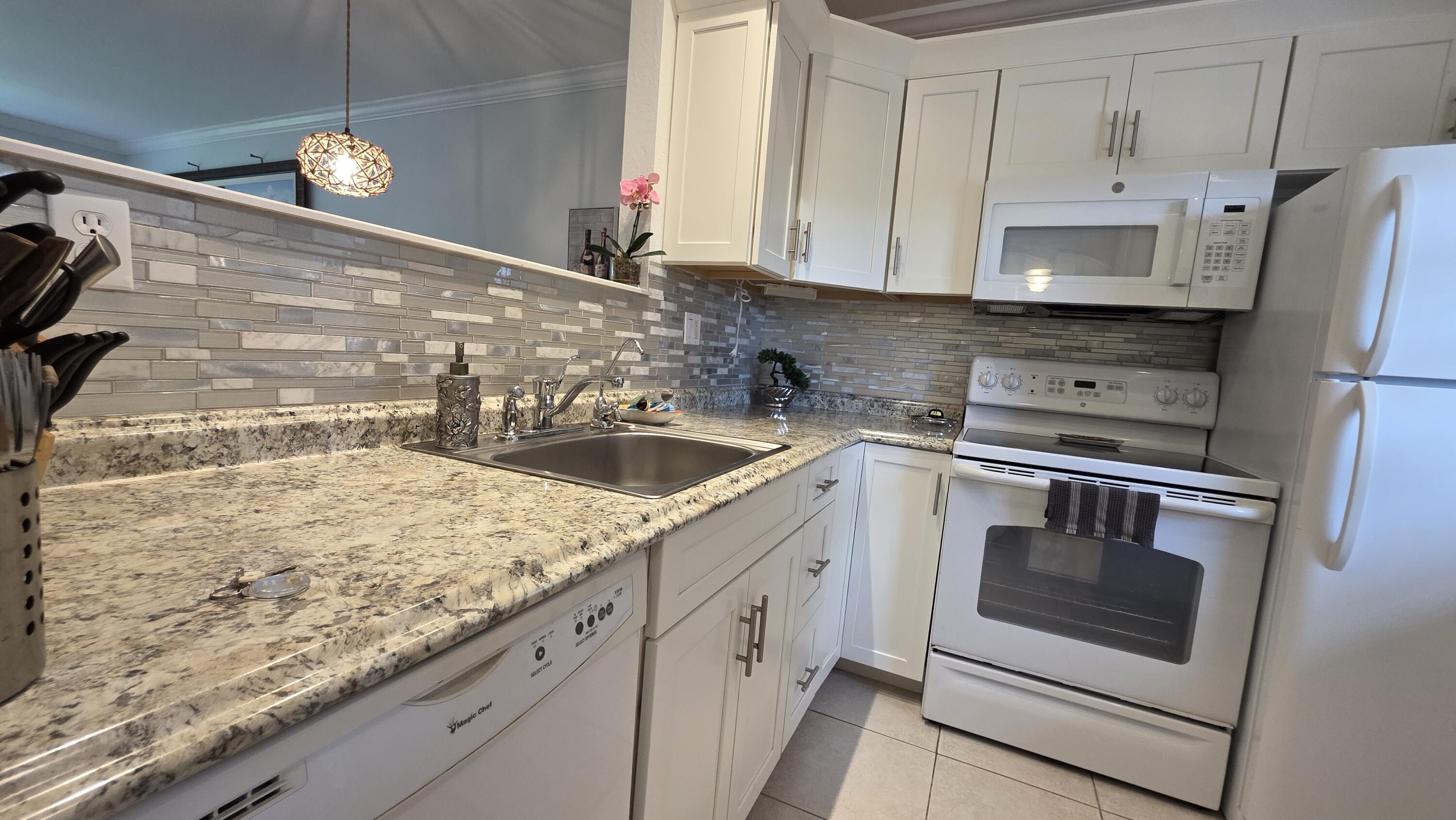 Welcome to this beautifully maintained and fully furnished 1-bedroom, 1-bath condo in the heart of Lauderdale Lakes. This move-in-ready residence features elegant tile floors throughout, impact windows for added peace of mind, and breathtaking views of the sparkling pool and beautifully landscaped tropical grounds.  Extremely clean and lovingly cared for, this unit showcases true pride of ownership. Enjoy relaxing from your living area while overlooking the lush greenery and resort-style surroundings that make this community so desirable. The building and grounds are exceptionally well maintained, offering a peaceful and welcoming atmosphere year-round.  Being sold fully furnished, this condo is perfect for seasonal living, a winter retreat, or full-time residency.