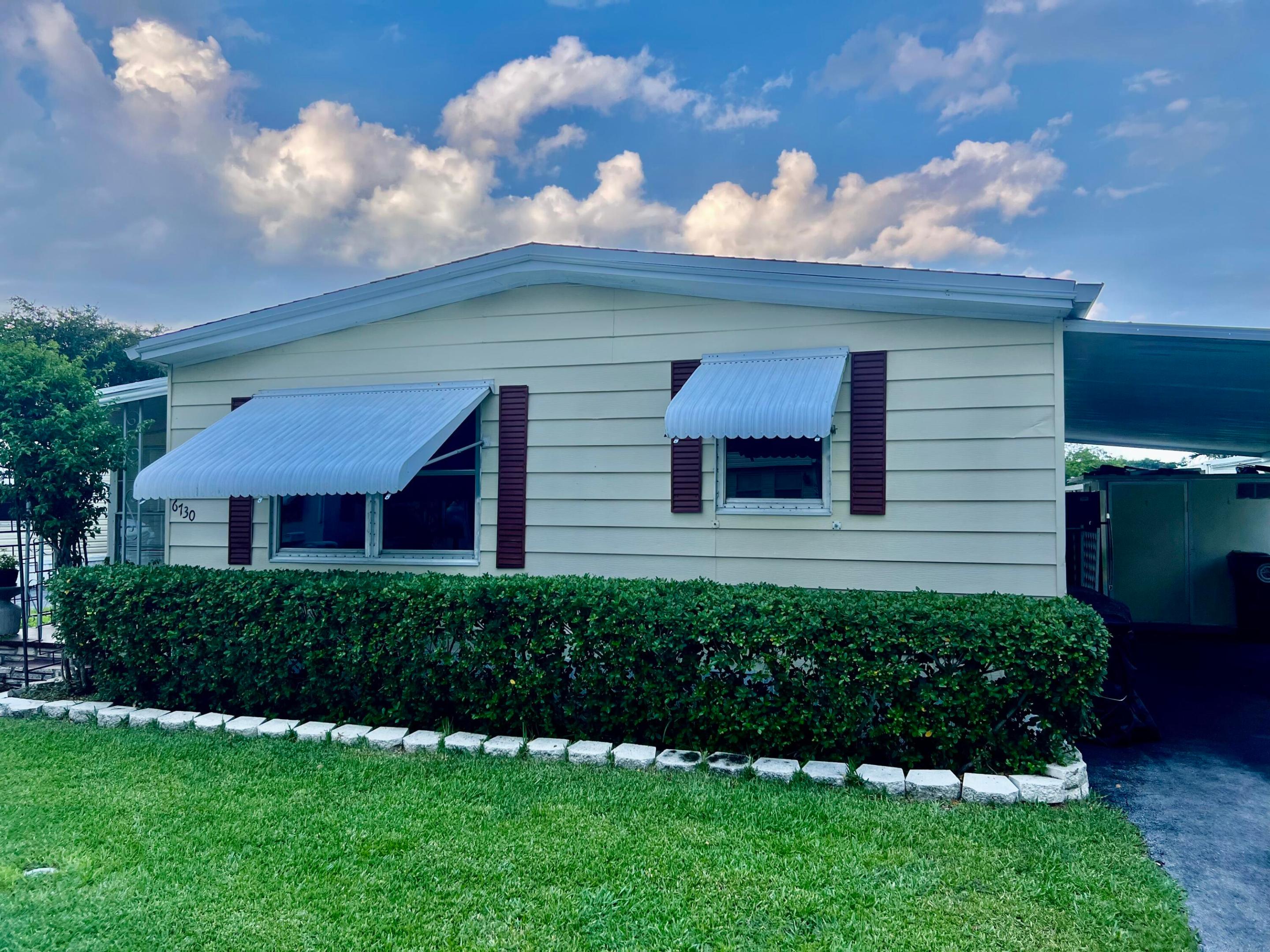 THIS IS A  MOBILE HOME WITHOUT A LAND, LOCATED IN A 55+ GATED COMMUNITY. IT HAS A NEW FLOOR AND  NEW SHADES. THE LOCATION IS CLOSE TO ALL MAJOR AIRPORTS, HOSPITALS, HIGHWAYS, SHOPPING, RESTAURANTS AND JUST FEW MILES FROM THE BEACH. THE COMMUNITY OFFERS LOTS OF ACTIVITIES. THE MONTHLY LOT RENTAL IS $1,169.48, WHICH INCLUDES THE WATER, TRASH REMOVAL, PEST CONTROL AND LANDSCAPING.
