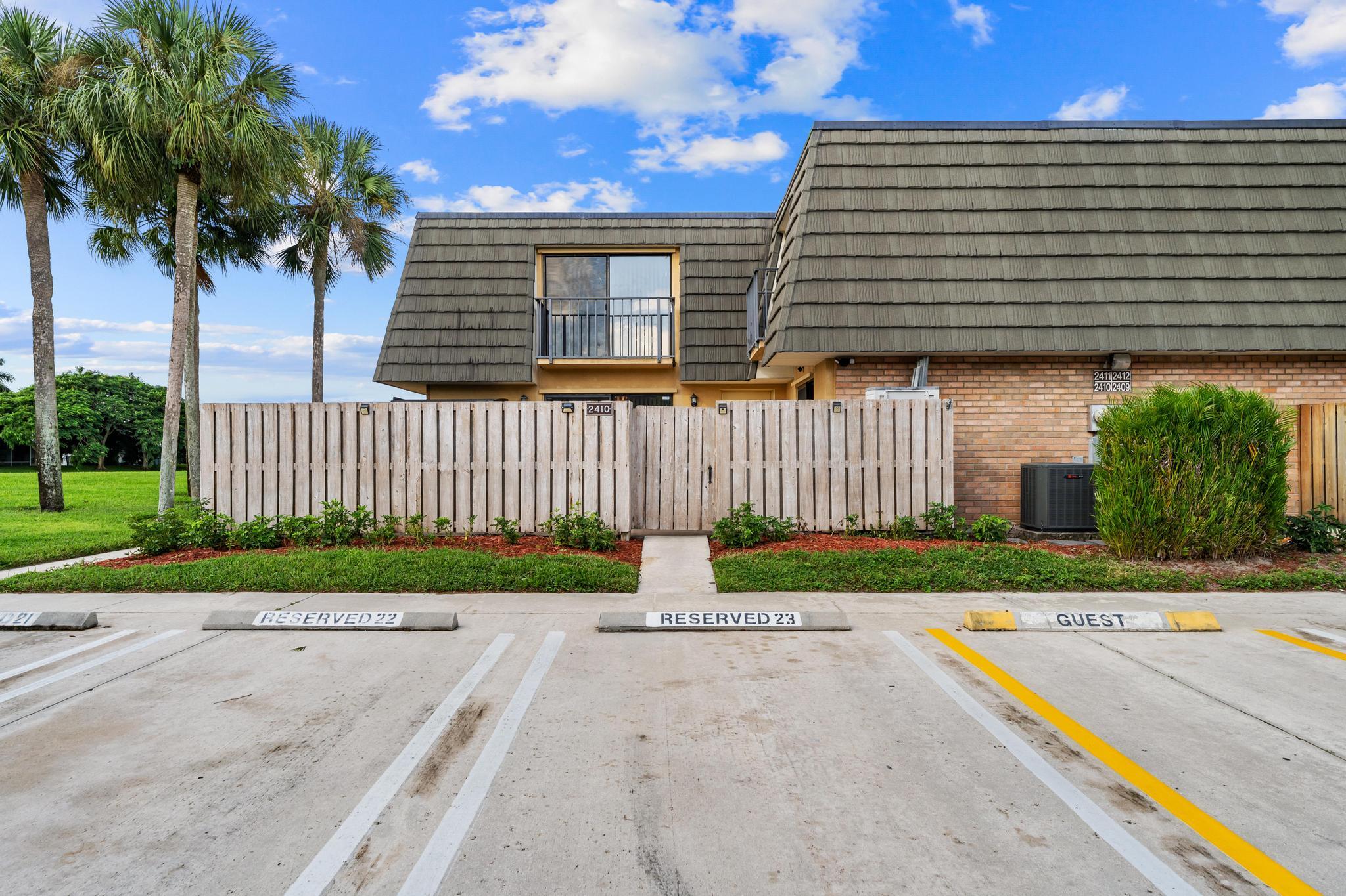 Beautiful corner lakefront townhome in the sought-after Sandalwood Lakes community! This 2BR/2.5BA home offers peaceful water views, a covered patio, walk-in closet, full panel shutters, and 2+ parking spaces. Enjoy resort-style amenities including a pool, pickleball, tennis, playground, fitness trail, and more. Ideally located near I-95, shopping, dining, beaches, and Downtown West Palm Beach, offering both convenience and a vibrant lifestyle!