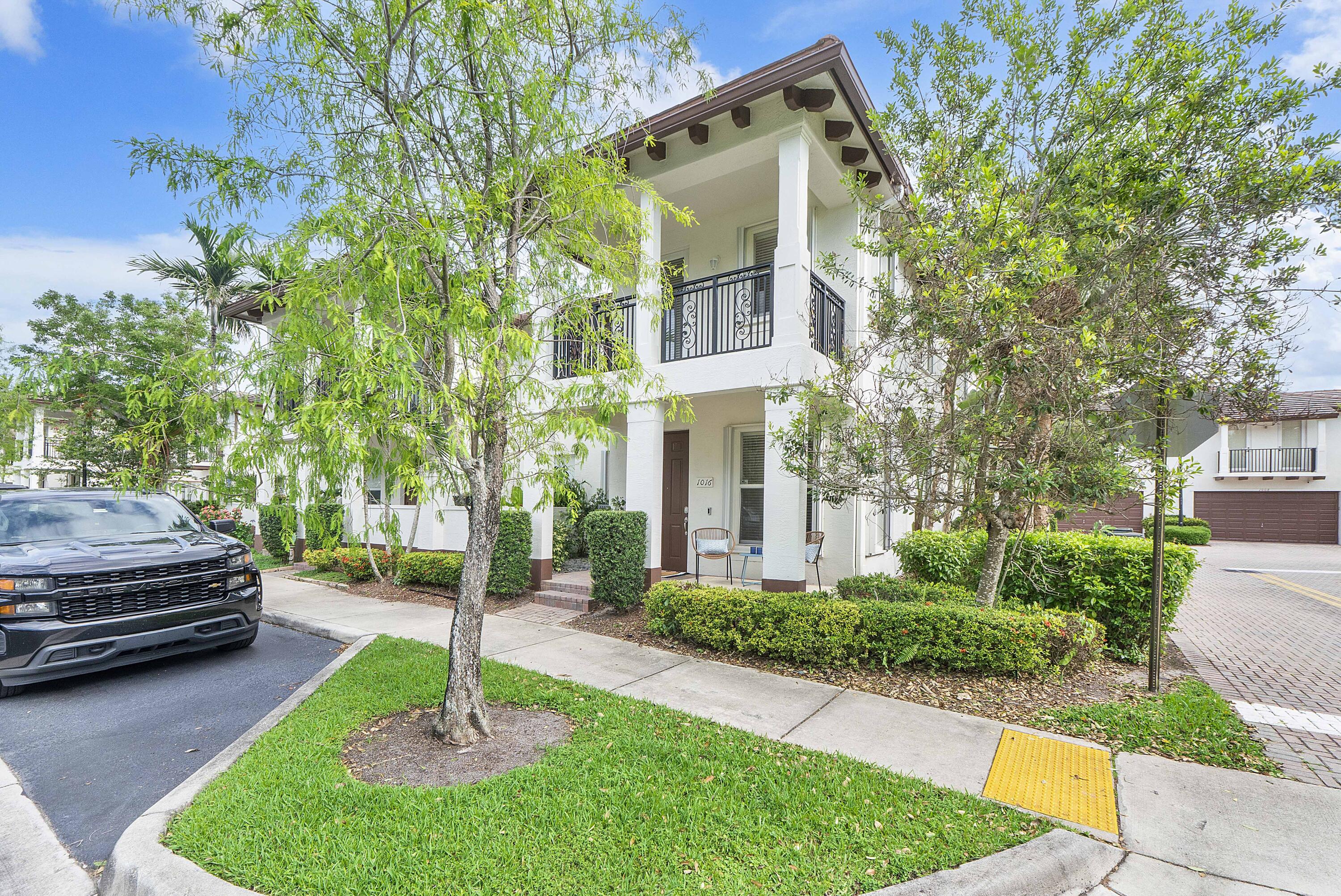 Welcome to Paloma Lakes, one of Coconut Creek's most desirable gated communities! This beautifully maintained 3-bedroom, 2.5-bathroom has a 2 car garage and is an END UNIT. Primary suit has huge bathroom, 2 walk-in closets and balcony. Additional features: AC 1 year old, According shutters. Paloma Lakes is known for its prime location and resort-style lifestyle. Residents enjoy a gated entrance, community pool, scenic fitness paths, and beautifully maintained grounds. Just steps away from The Promenade at Coconut Creek, you'll have some of the area's best dining, shopping, entertainment, and nightlife right at your doorstep. Conveniently located near major highways, top-rated schools, parks, and only a short drive to South Florida beaches. * Some Photos are virtually staged
