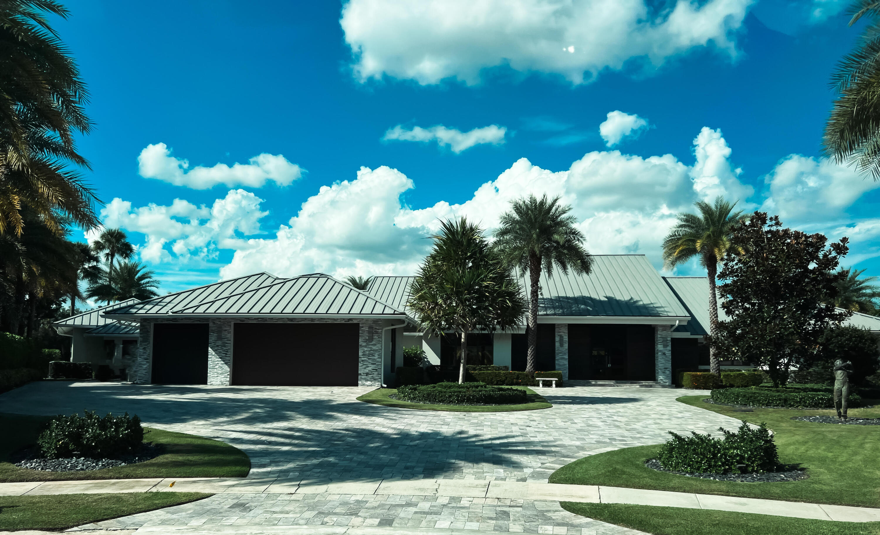 Nestled at the end of a serene cul-de-sac on a massive panoramic golf course lot, this stunning contemporary residence in the prestigious Delaire Country Club is an entertainer's dream and a true architectural marvel. From the moment you step inside, you're greeted by luxurious, light-filled spaces with walls of windows that showcase breathtaking views of the meticulously maintained golf course and resort-style pool. 
Boasting 4 generously proportioned bedrooms, including two lavish primary suites, this home offers exceptional privacy and comfort. The open-concept floor plan flows effortlessly, with sleek porcelain tile flooring throughout. The state-of-the-art kitchen is a culinary delight, featuring an abundance of cabinetry, a massive walk-in pantry, a coffee bar, and a large center island perfect for entertaining. The living area is anchored by a custom-built bar, creating the ideal setting for hosting intimate gatherings or lively parties. Every window provides a spectacular view, leading to the outdoor oasisa resort-style pool surrounded by a sprawling covered lanai, complete with an outdoor kitchen. This is the ultimate entertainment house, perfect for hosting unforgettable events or relaxing in style. Additional features include two stylish cabana baths, soaring high ceilings, and impact windows for peace of mind. With natural gas available on the street and a generator in place, this home ensures year-round comfort and convenience. Located in the heart of the award-winning Delaire Country Club, this home embodies the pinnacle of luxury living, combining dramatic design, unparalleled amenities, and a prime golf course location. Delaire Country Club is not just a residence, but a private boutique country club, where 324 custom homes surround a 27-hole championship golf course that requires no tee time. The clubhouse itself is a work of art, featuring a state-of-the-art 16,000 sq ft fitness center, outstanding culinary cuisine, a resort-style pool area, 4 brand new pickle ball courts and 8 Har-Tru tennis courts. Enjoy the generous extended family policy that Delaire offers, ensuring that you and your loved ones can fully embrace the country club lifestyle.



This is not just a homeit's a lifestyle. Experience the very best Delaire has to offer in this one-of-a-kind property!