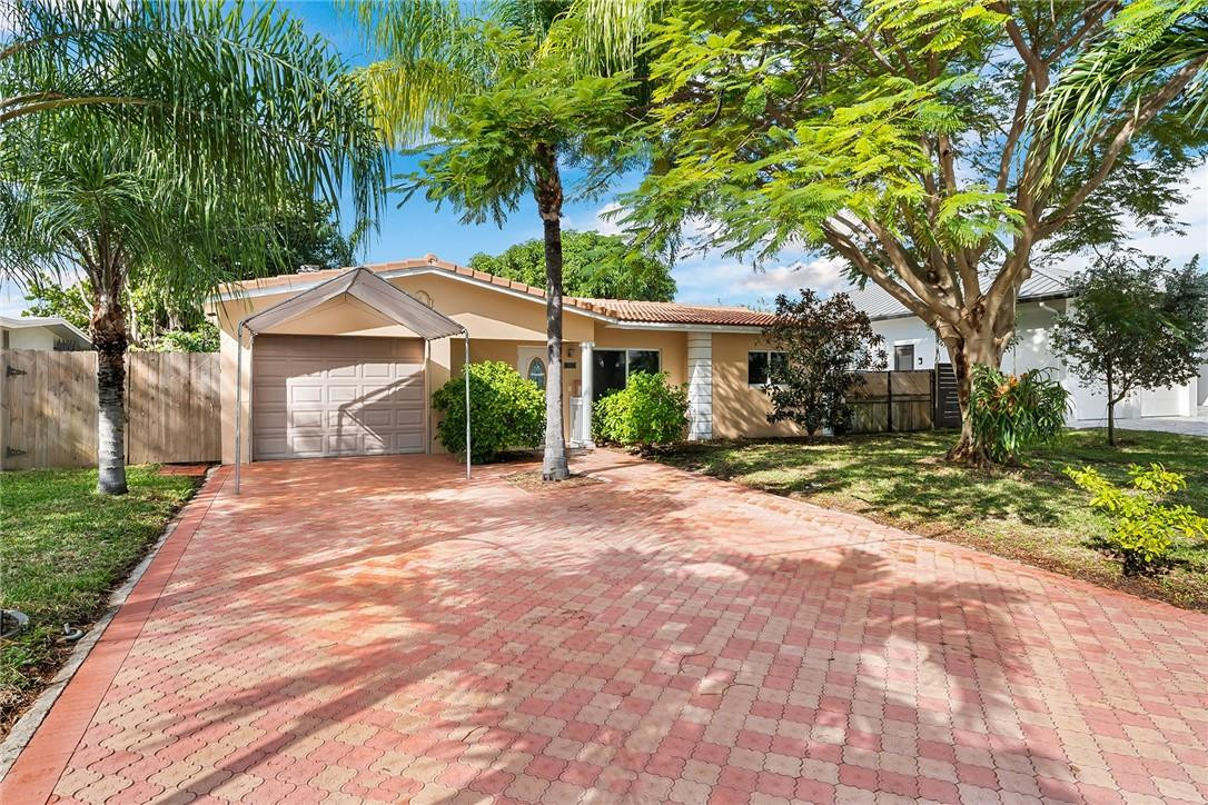 Highly desirable Snug Harbor waterfront home with only 1 bridge (Federal Hgwy) to the inlet. 70 ft of waterfront living! Renovations include a custom designed kitchen with granite tops and stainless steel appliances, new roof in 2018, new central ac in 2021, redone master bath with tile to ceiling design , tankless water heater  and porcelain tile in living area. Area off the kitchen currently used for an office. Nice sized florida room for additional living space. Attached 1 car garage and room for RV or boat parking on the north side of the property. Pet on premises. Easy to show with a little notice.