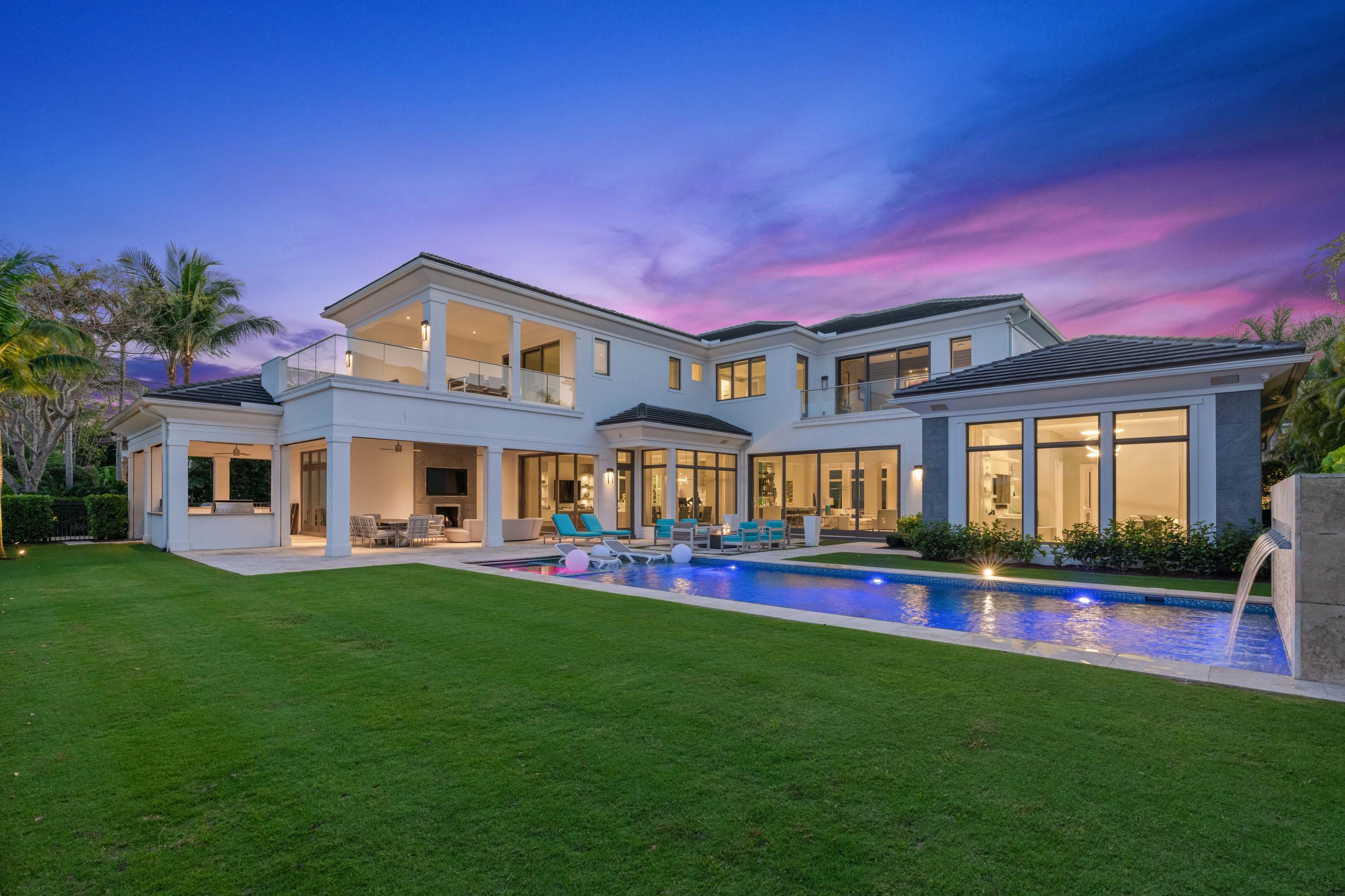 STUNNING, MODERN, CUSTOM, PRIVATE AND AN EXCEPTIONAL VIEW BEST DESCRIBE THIS SPECTACULAR ESTATE BEING OFFERED IN THE EXCLUSIVE OLD PALM GOLF CLUB. A RARE HOME WITH GOLF COURSE AND WATER FEATURE VIEWS.  THIS HOME IS JUST UNDER 7500SF, OFFERING 5 BEDROOMS, 7.1 BATHS, TWO OFFICES (ONE ON FIRST, THE OTHER ON SECOND), A SOUND PROOF MEDIA/PLAYROOM, HIS AND HER BATHS IN PRIMARY BED, TEMPERATURE CONTROLLED WINE ROOM, TWO SECOND FLOOR BALCONIES WITH VIEWS THE ENVY OF THE COMMUNITY, AND MUCH MORE. AN OVERSIZED POOL, A LARGE SUMMER KITCHEN, PHANTOM SCREENS, A LARGE GRASS YARD, A GAS FIRE PIT AND A PRIVATE GOLF CART ENTRANCE TO THE GOLF COURSE ACCENTUATE THE PERFECTLY DESIGNED EXTERIOR SPACE. MEMBERSHIP IS REQUIRED. A MUST SEE.