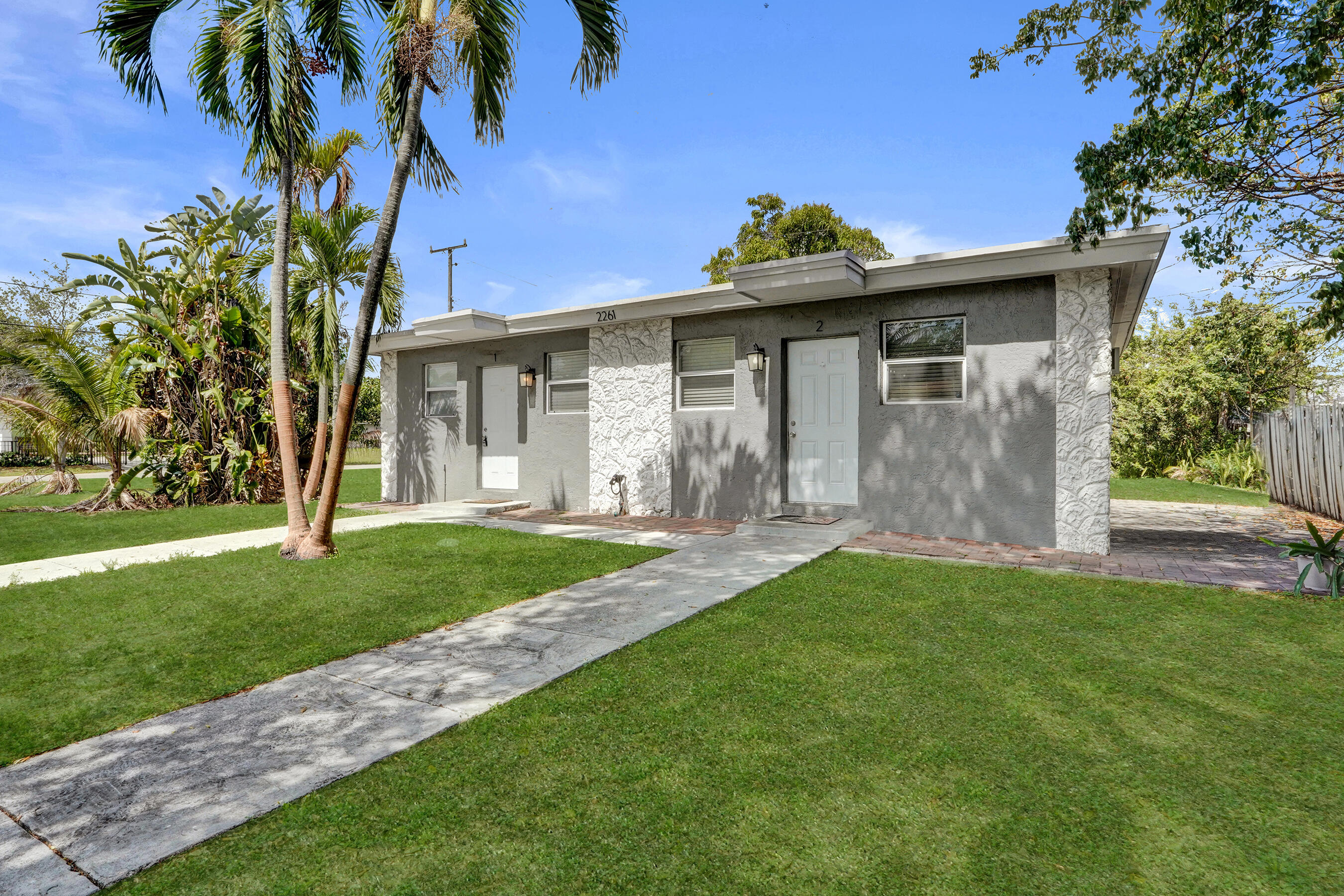POMPANO BEACH IS THRIVING—invest where the growth is happening! Income-producing duplex on nearly a 0.25-acre lot zoned RM-12 (Multi-Family). Both units are rented, creating immediate cash flow for investors. Property features a shared water meter and two separate electrical panels. Huge value in the land with strong redevelopment potential—build new, expand, or redevelop while collecting rental income. Located in an area seeing major transformation with ongoing development throughout Pompano Beach. Ideal opportunity for investors looking to secure property in a rapidly growing market. Drive by first before requesting a showing. Buyer and agent to verify all information with the City of Pompano Beach.