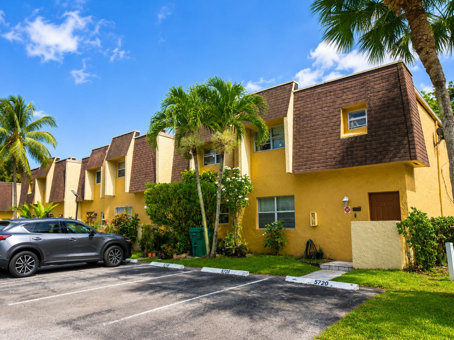 Don't miss this beautifully remodeled  townhome! This move-in ready home features tile and laminate wood flooring throughout, a spacious kitchen, tastefully updated bathrooms, and washer/dryer hookups for added convenience. Enjoy your own private fenced patio, perfect for relaxing, entertaining, or dining outdoors. Residents also have access to fantastic community amenities, including a swimming pool and basketball court. Ideally located just minutes from the Florida Turnpike, shopping, dining, and everyday conveniences, this home offers the perfect combination of comfort, style, and accessibility. Schedule your private showing today—this one won't last!